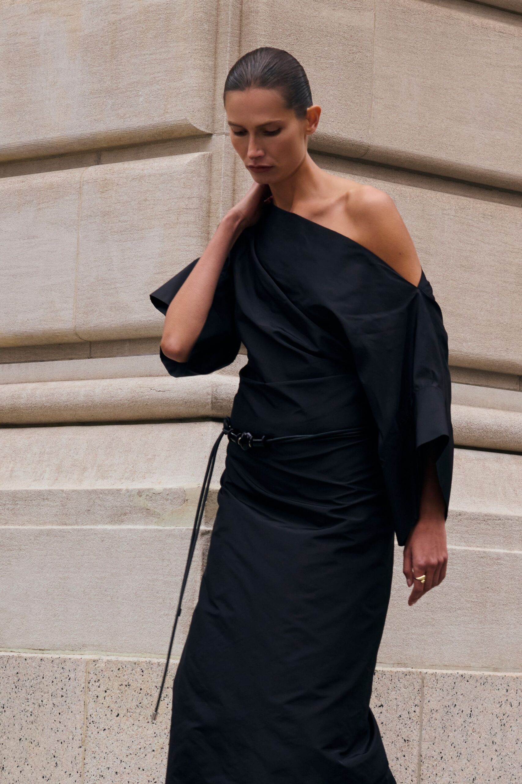 black off-shoulder draped dress
