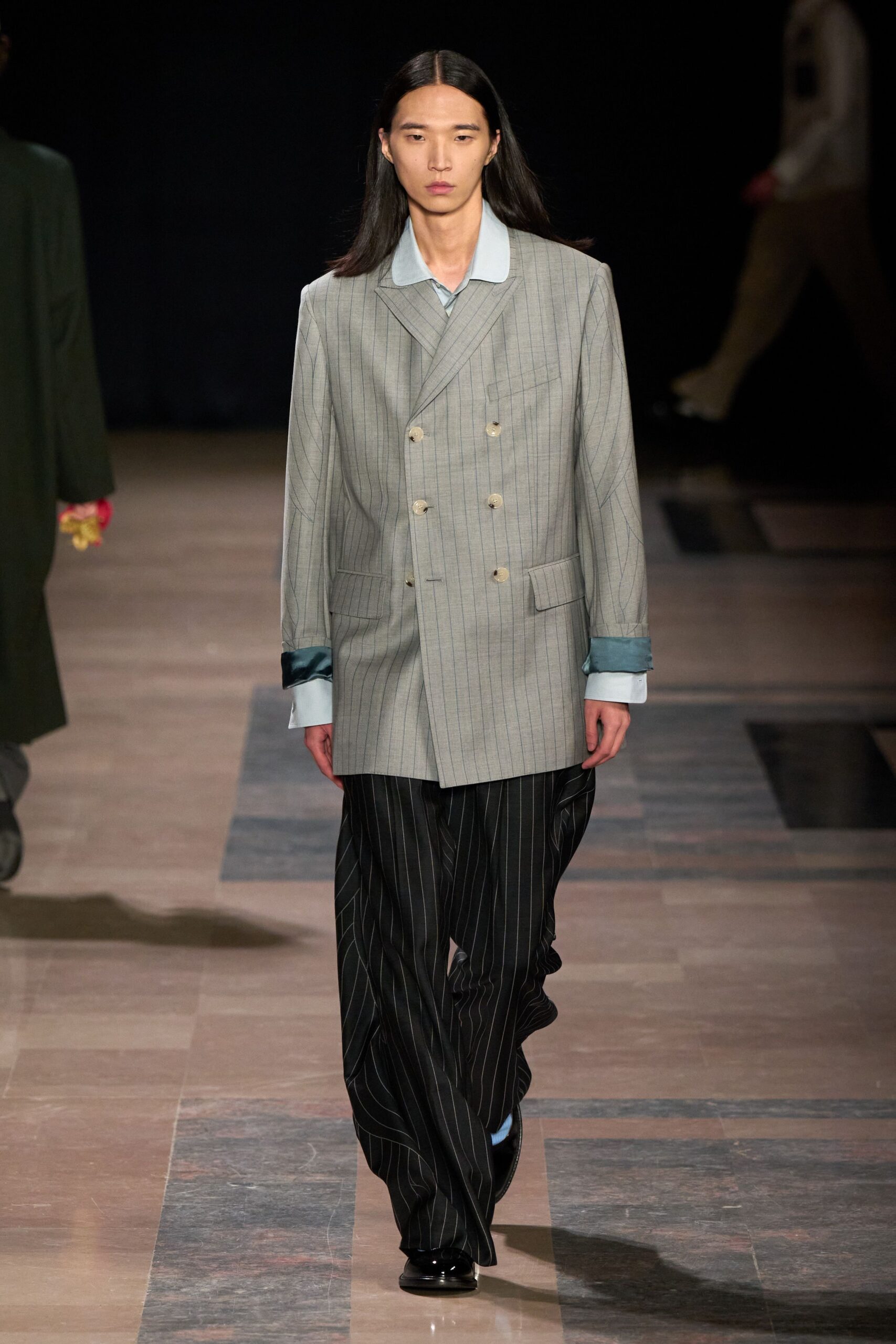 gray striped tailored blazer and black relaxed pants