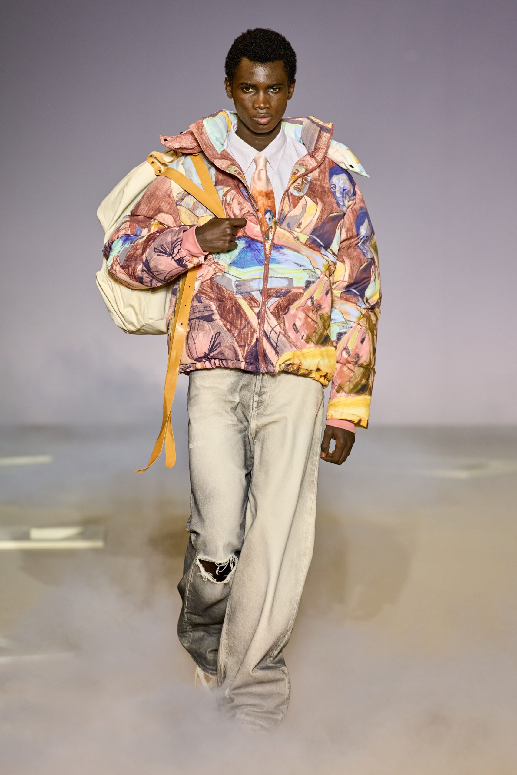 multi-colored jacket with distressed jeans