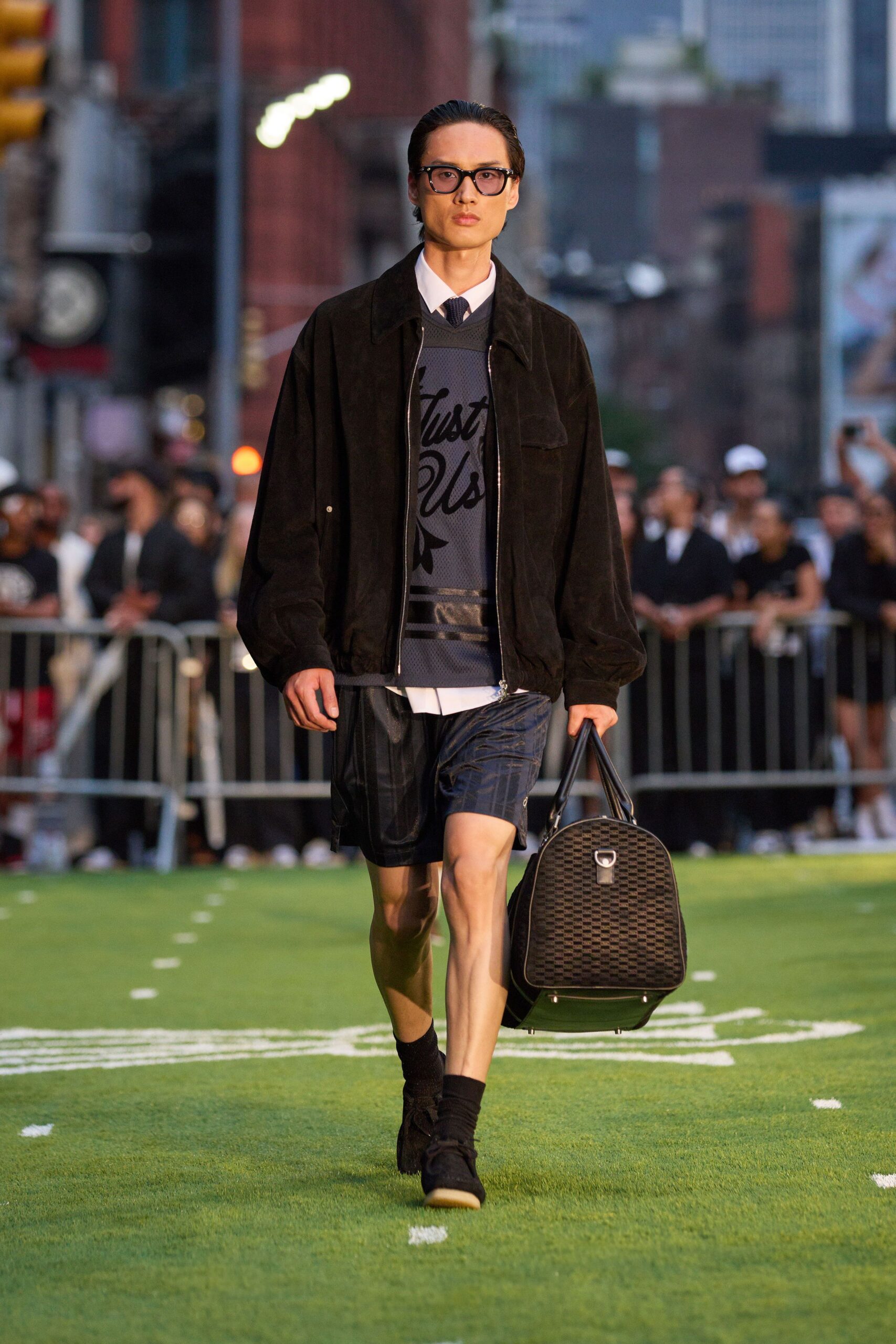 black suede jacket with denim shorts