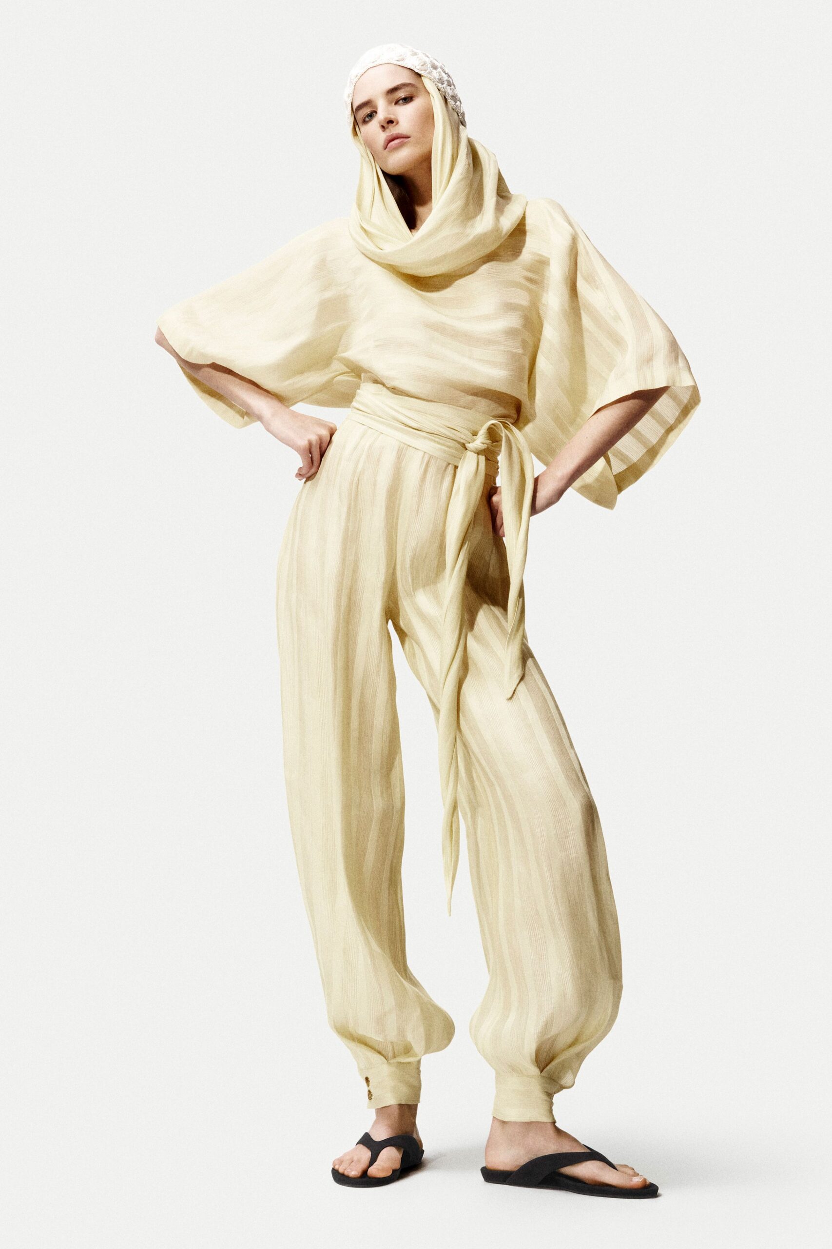 yellow cotton sleeveless v-neck relaxed pleated jumpsuit
