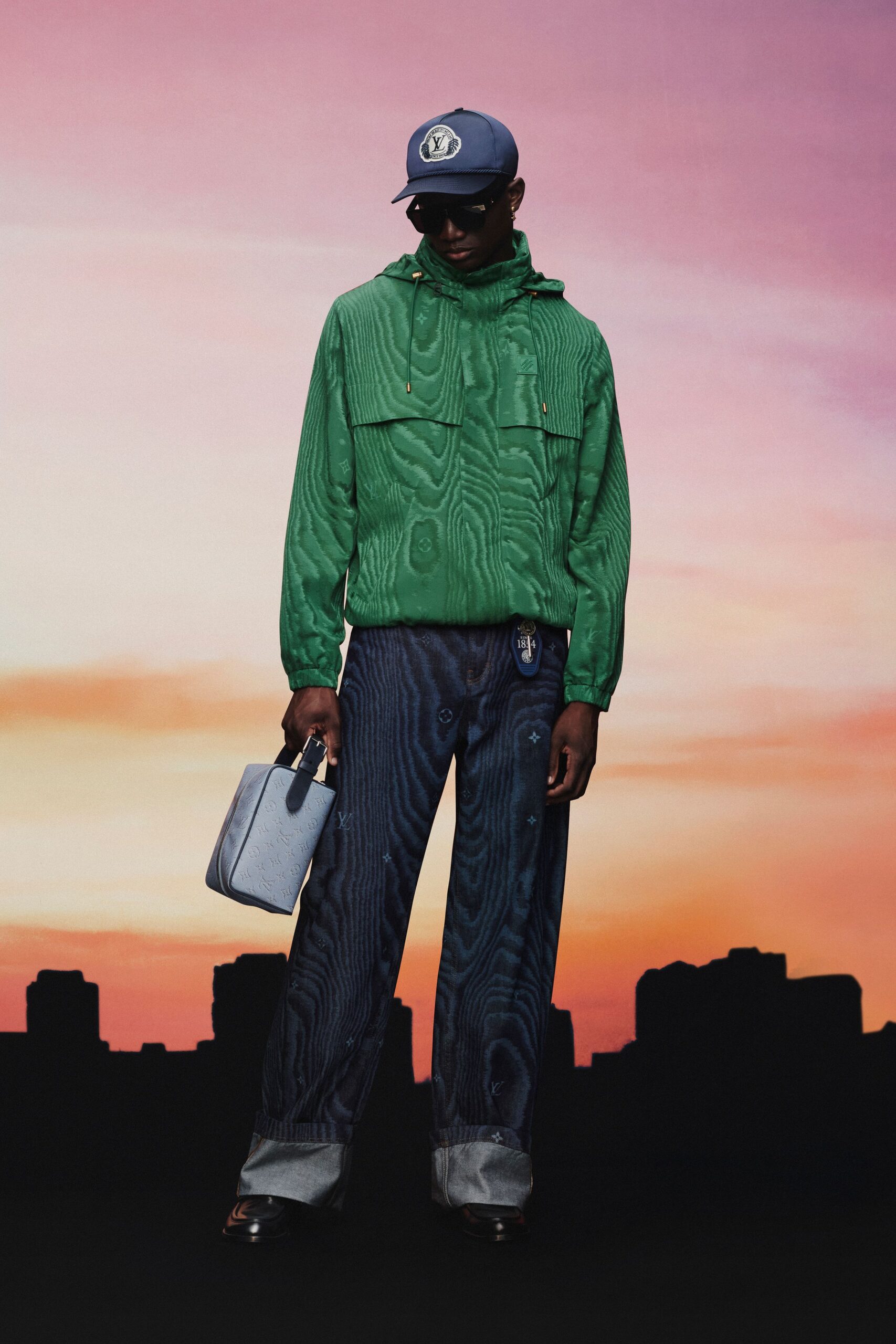 green relaxed jacket with blue pants