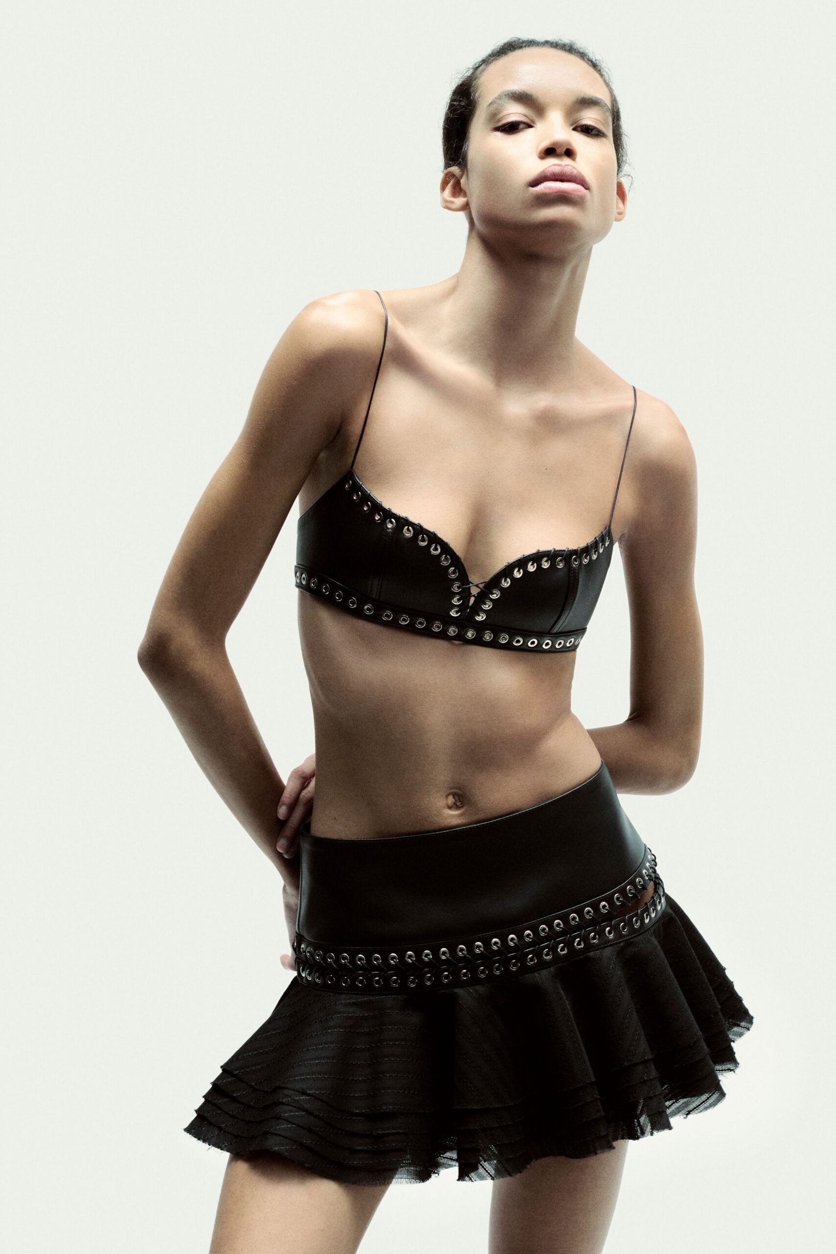 black leather fitted high-waisted flared embellished mini skirt