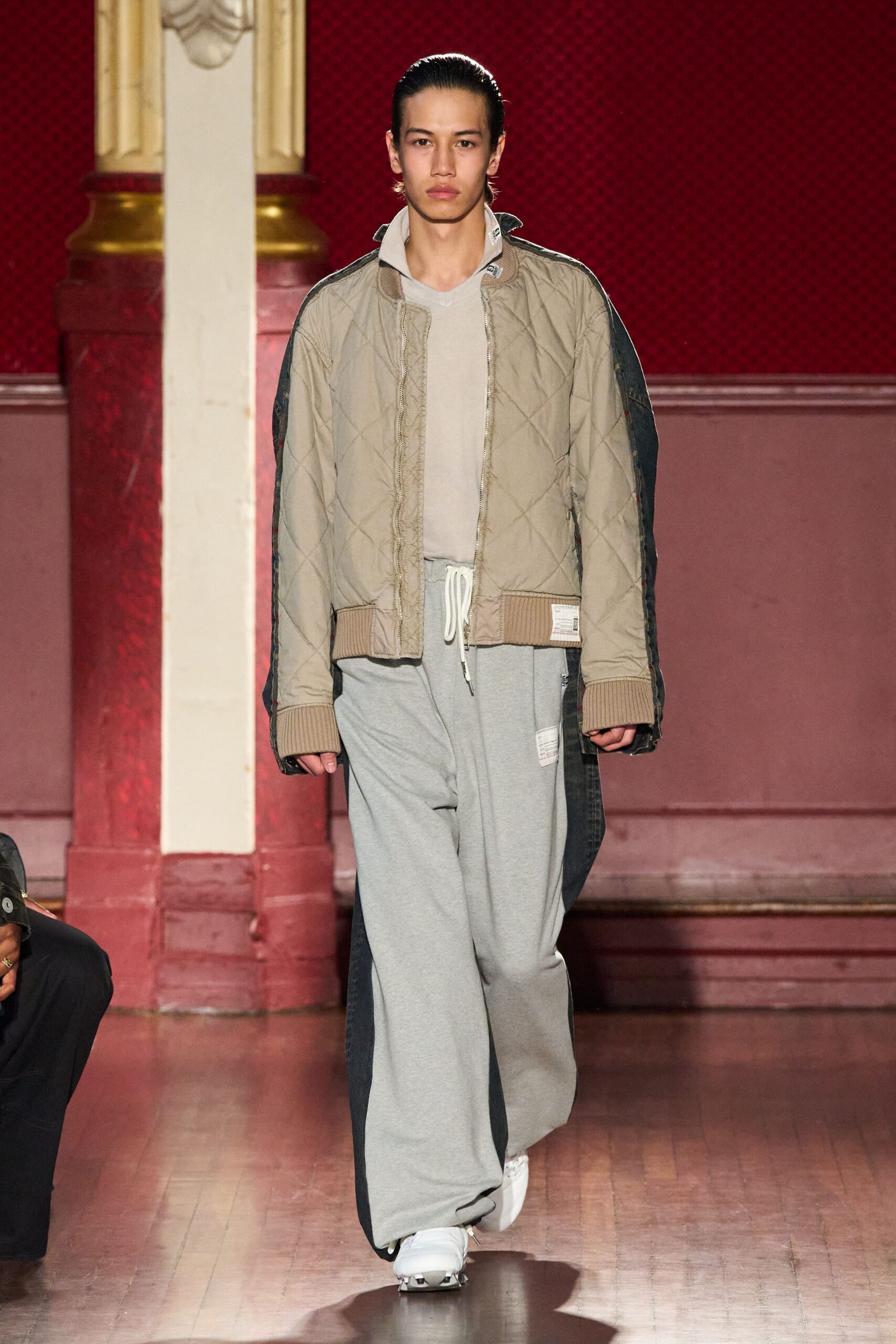 beige quilted jacket with gray pants