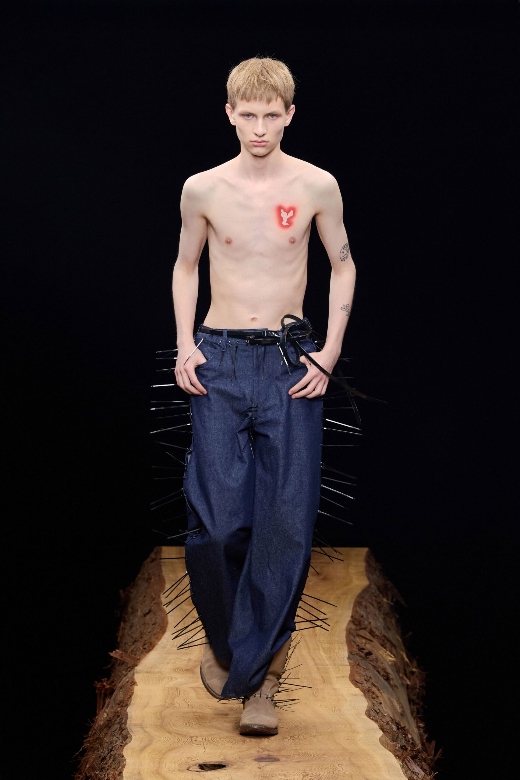 blue denim relaxed pants with brown shoes