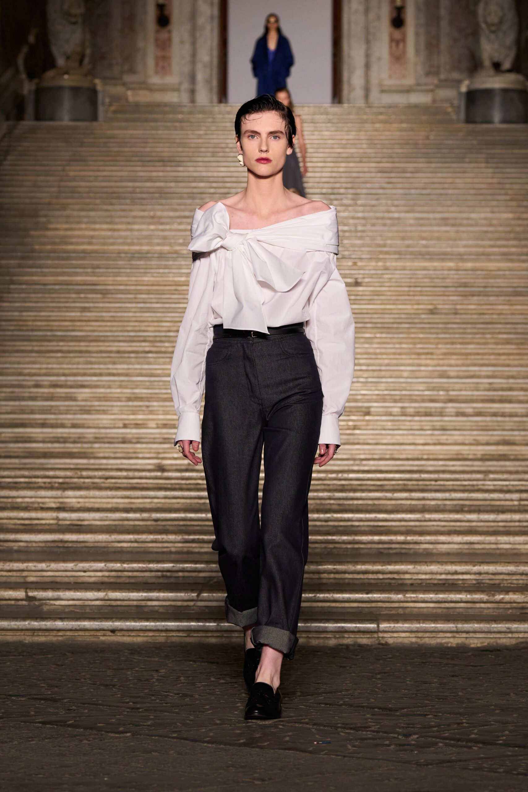 white off-shoulder blouse with black pants