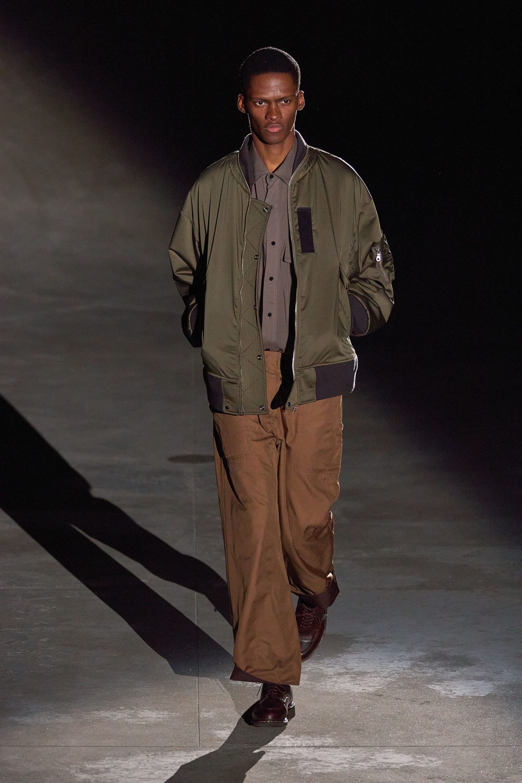 green relaxed jacket with gray shirt