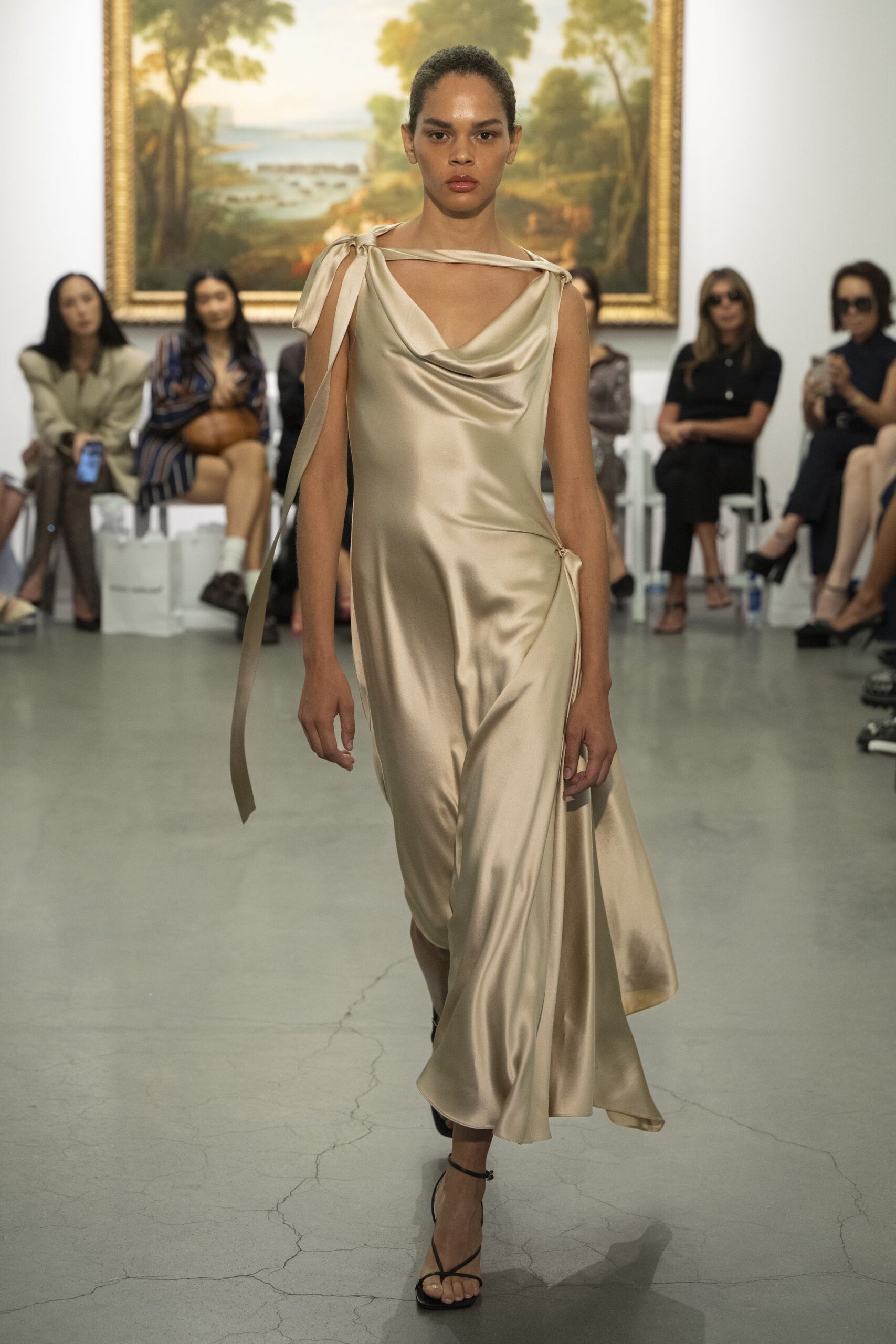 beige silk sleeveless v-neck fitted draped flowing dress