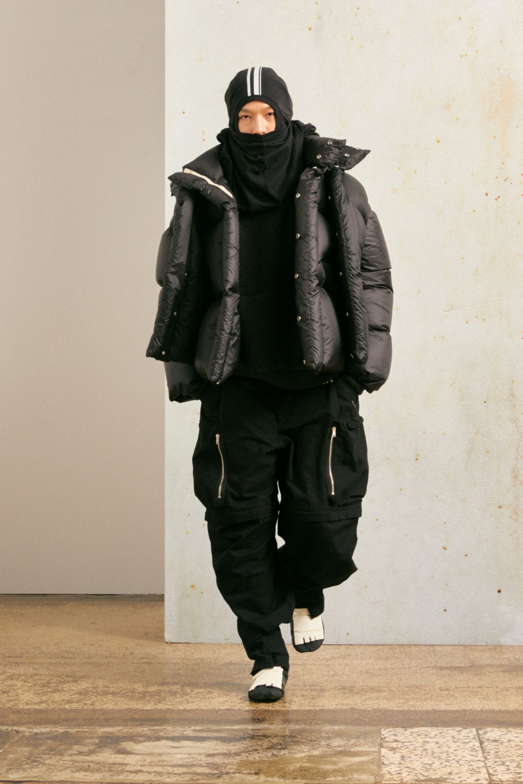 black puffer jacket and cargo pants