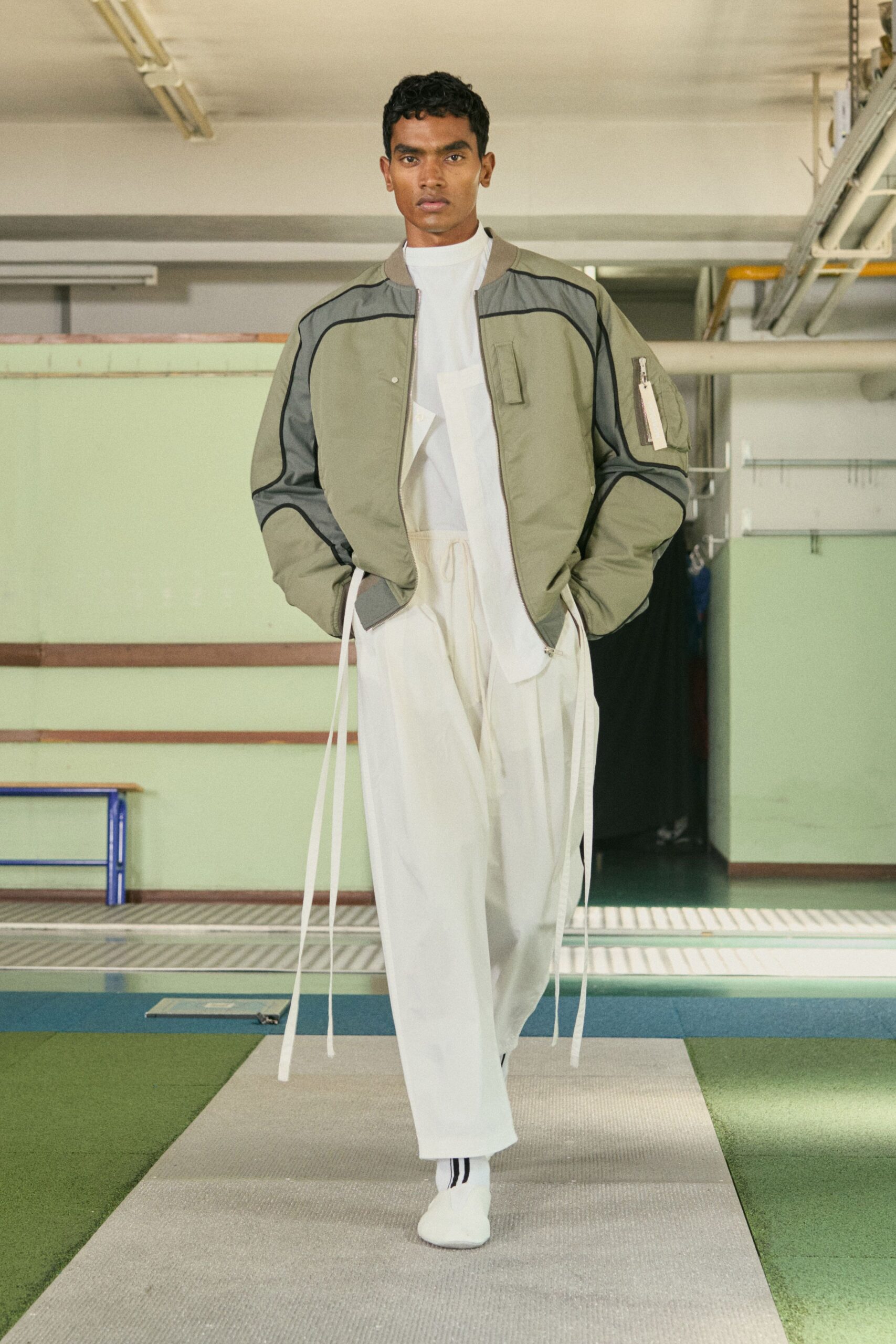 green relaxed jacket with white shirt and pants