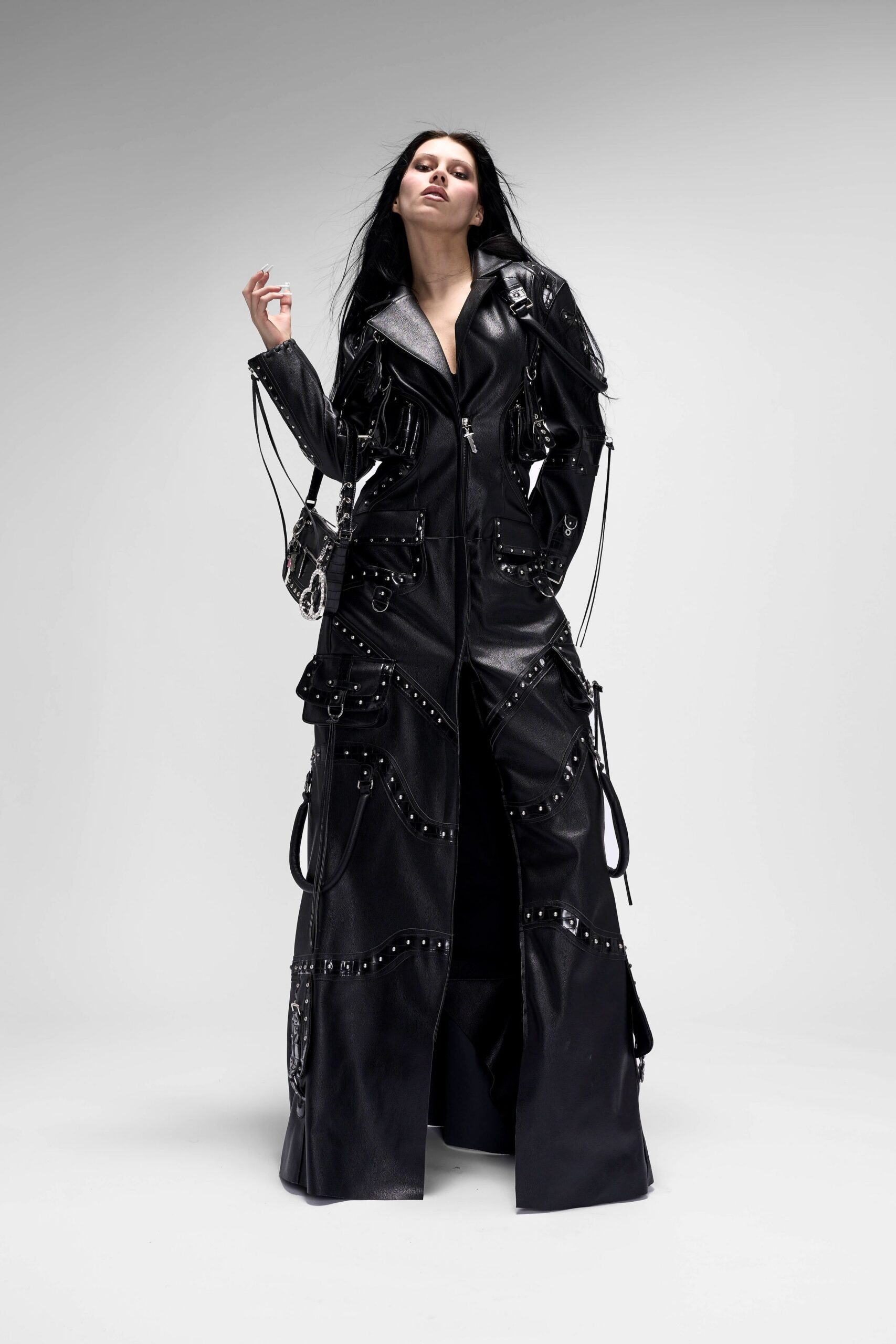 black leather long-sleeve collared fitted zippered pockets jumpsuit