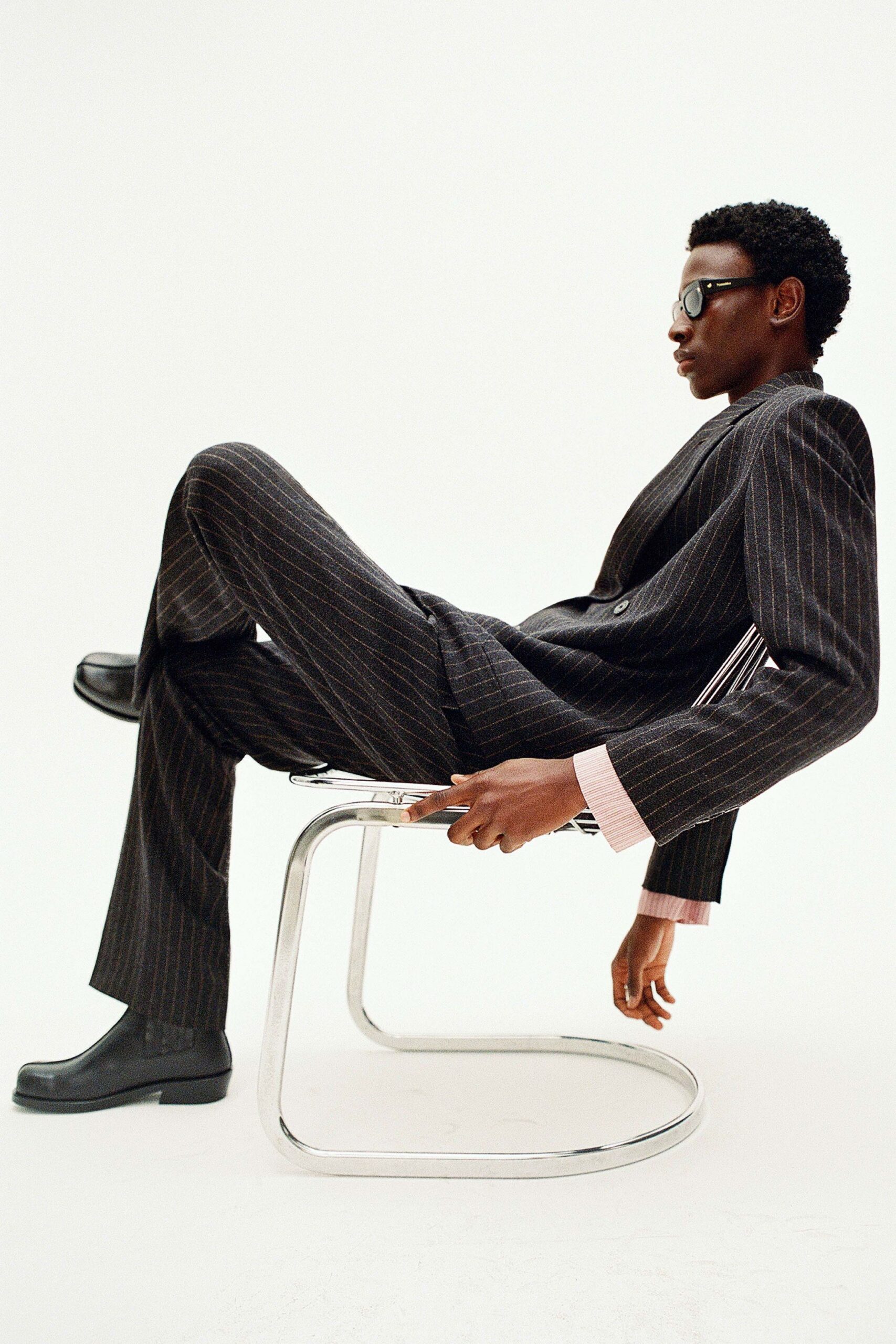 black wool long-sleeve collared tailored striped suit