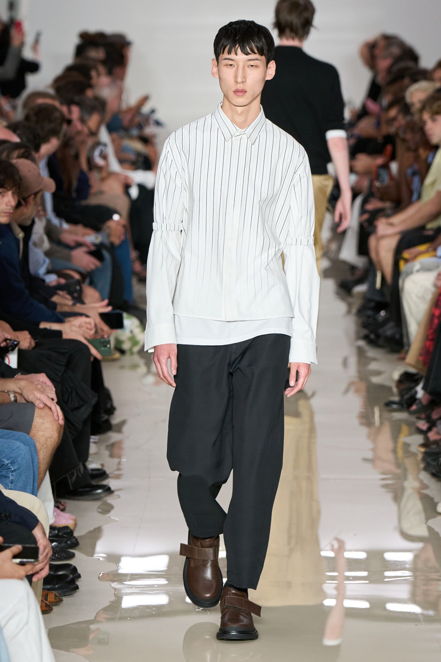 white relaxed shirt with black pants