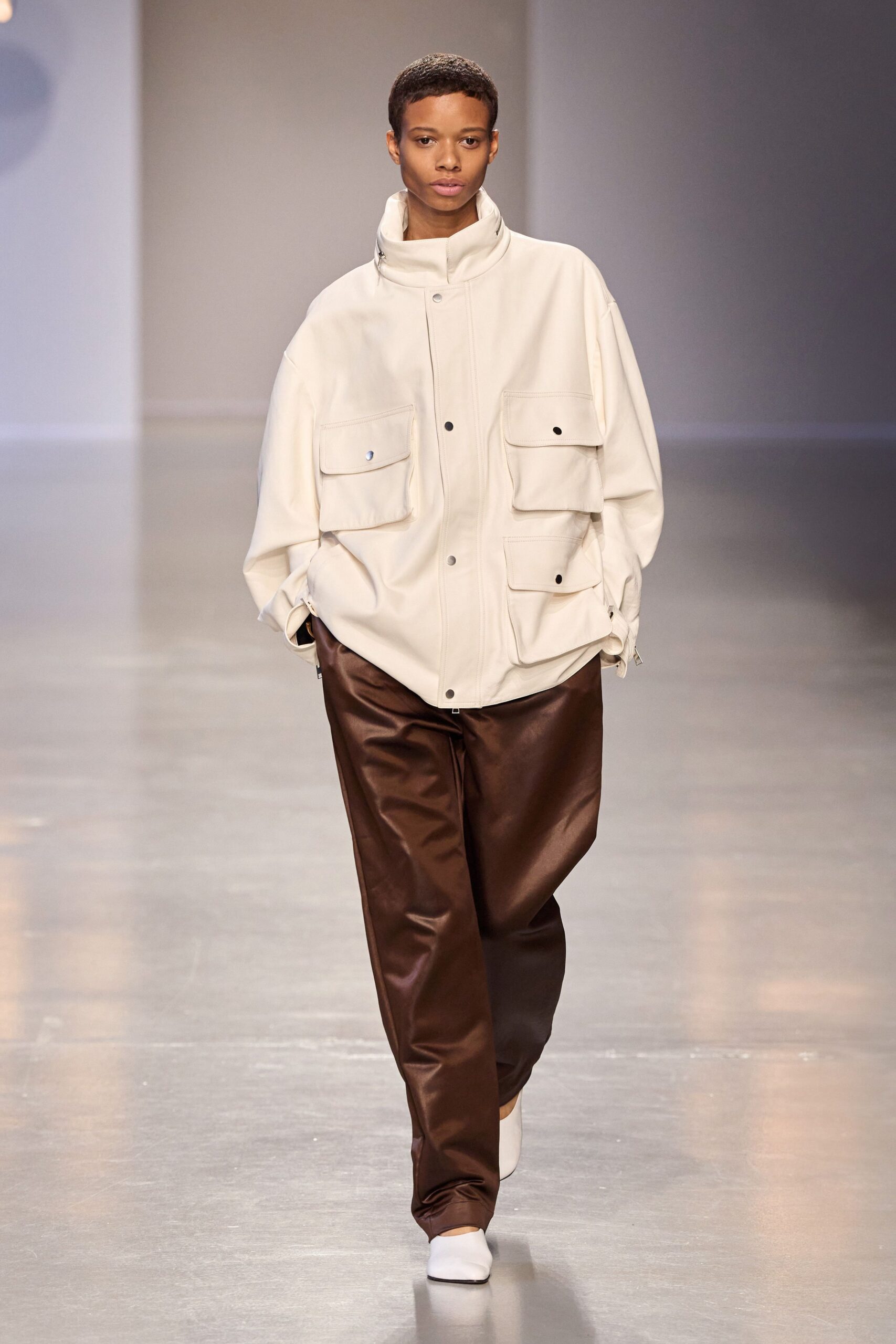 white oversized jacket brown pants