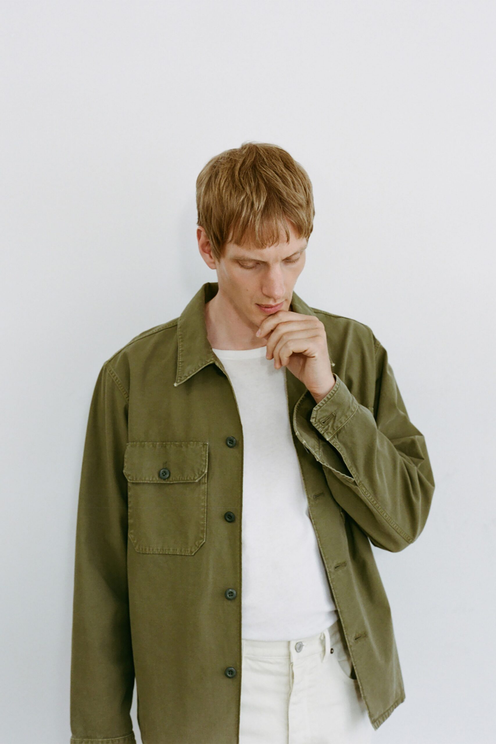green cotton long-sleeve collared relaxed buttoned jacket