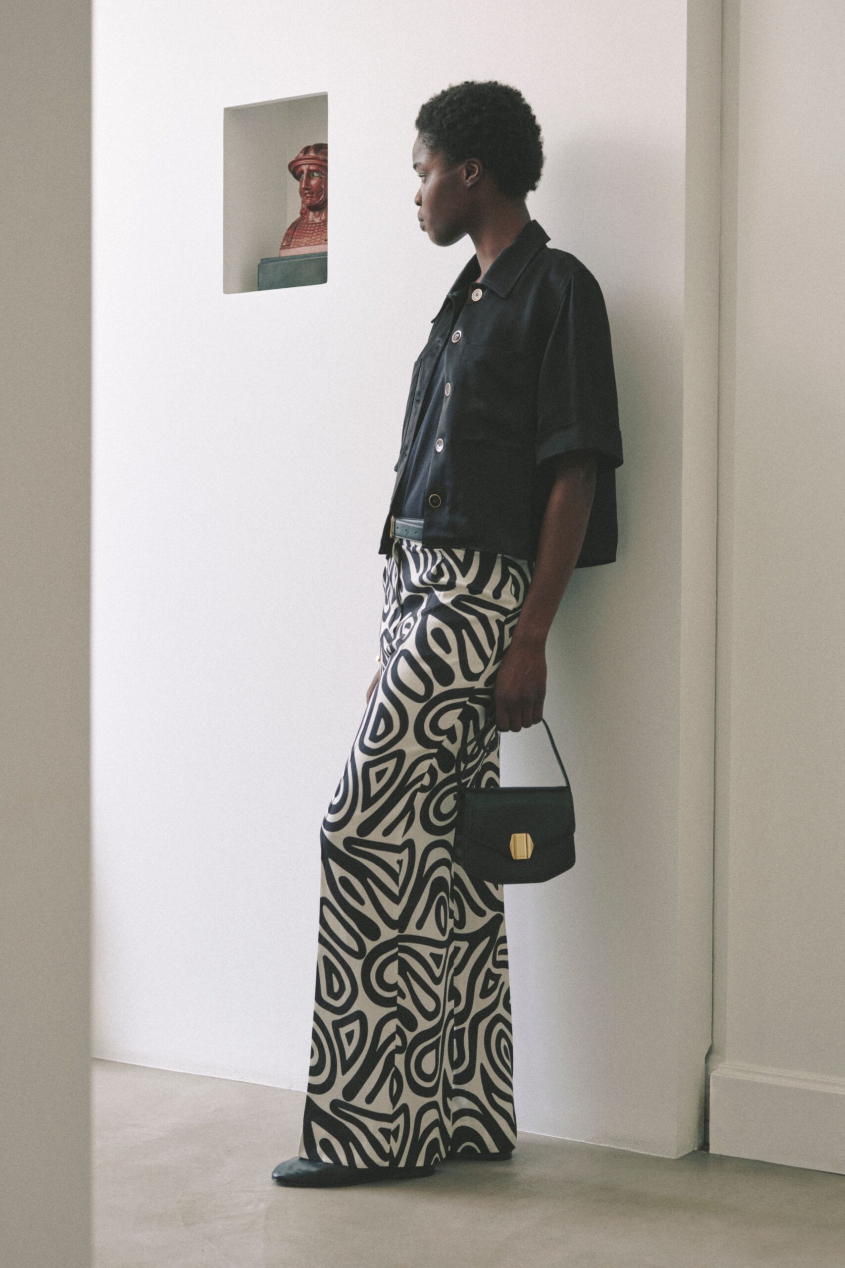 black relaxed jacket with printed pants