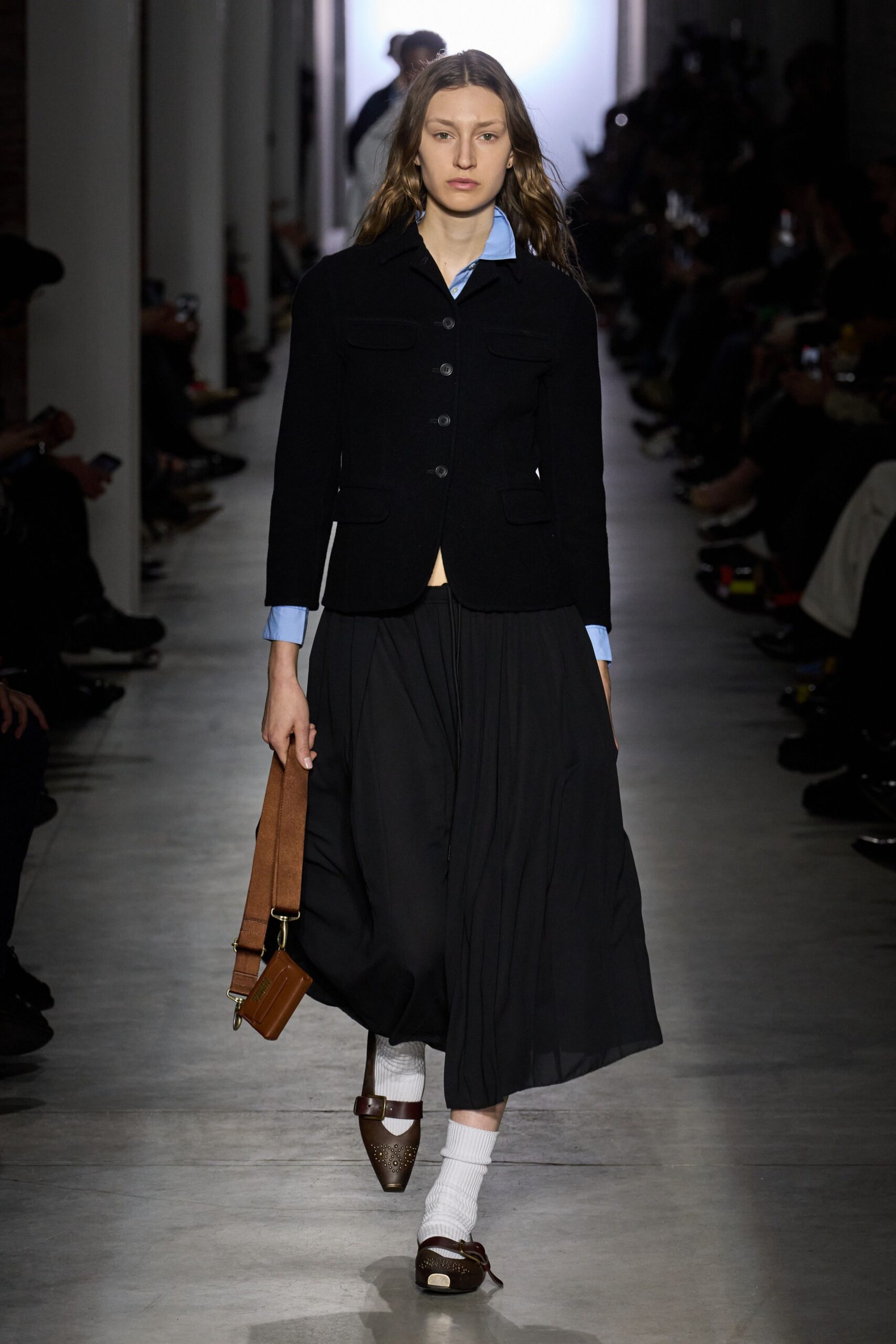 black jacket blue shirt midi skirt