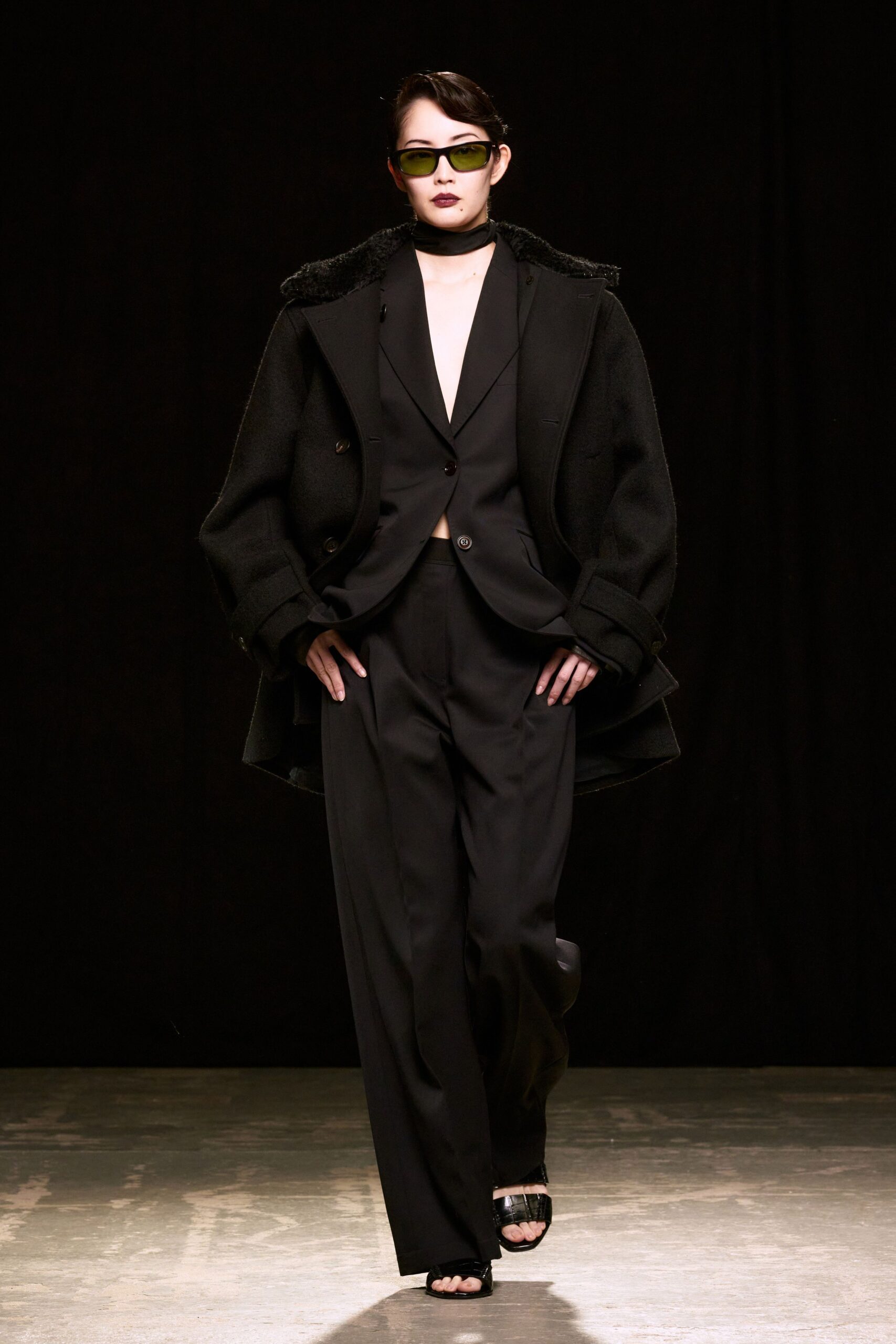 black oversized coat and tailored blazer
