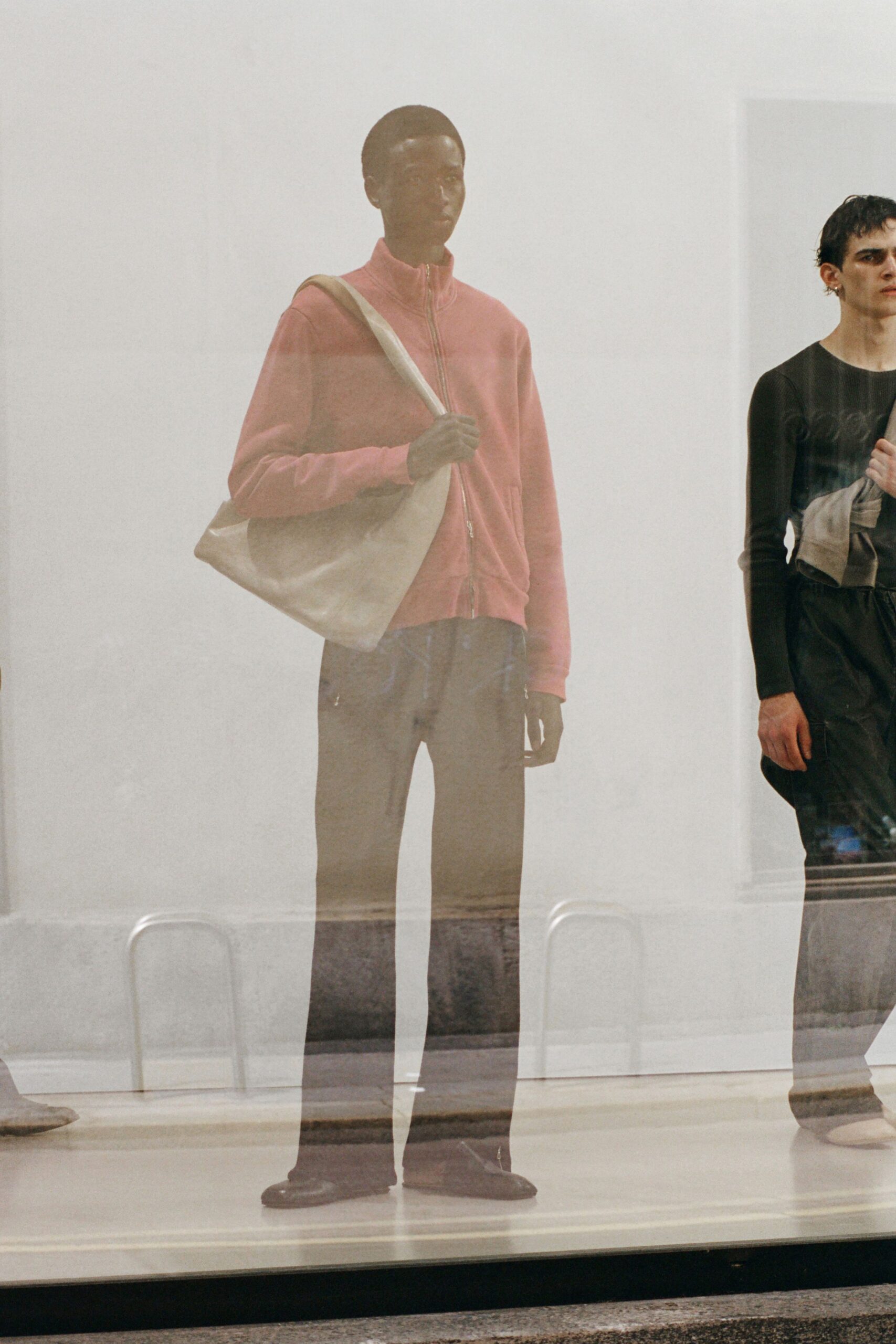 pink relaxed jacket with black pants