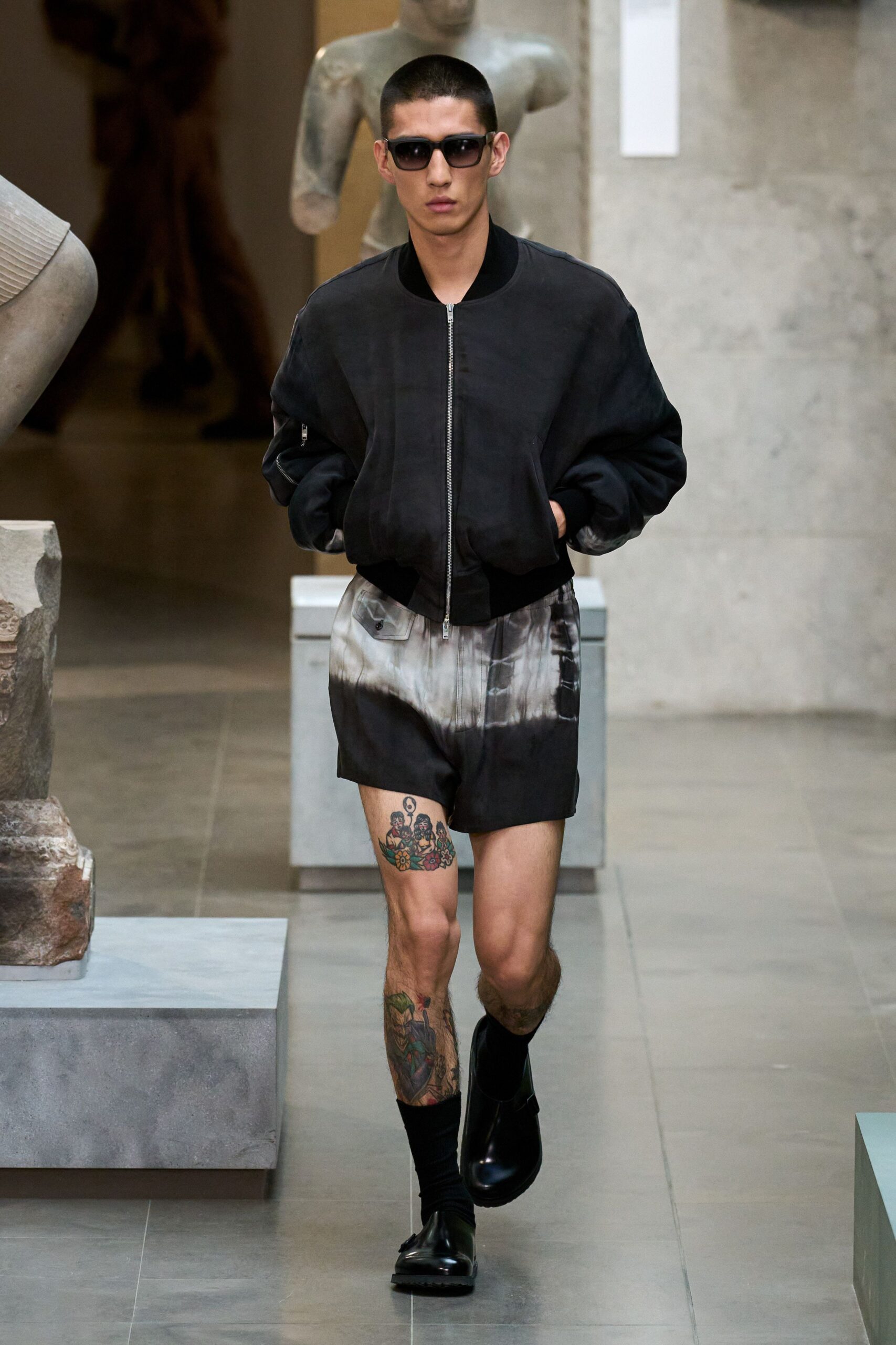 black fitted jacket and shorts