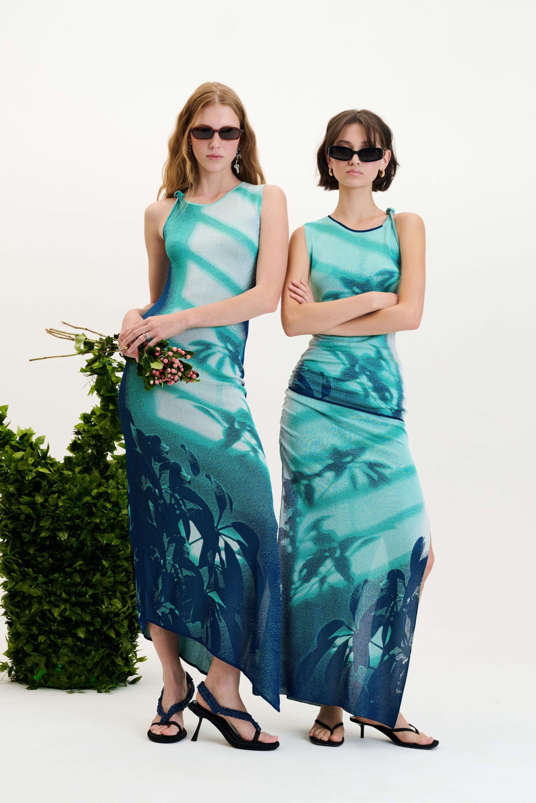 blue silk sleeveless high-neck fitted flared printed dress