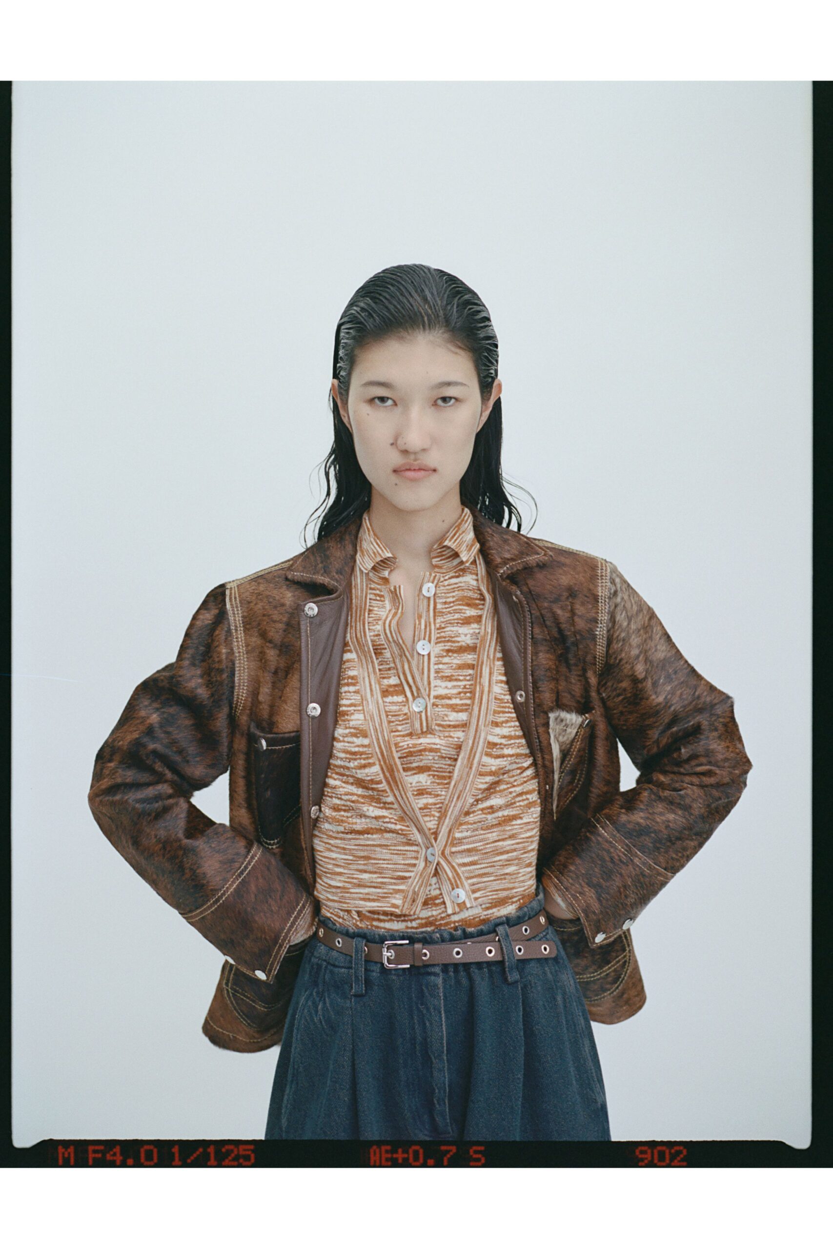 brown leather jacket with striped shirt