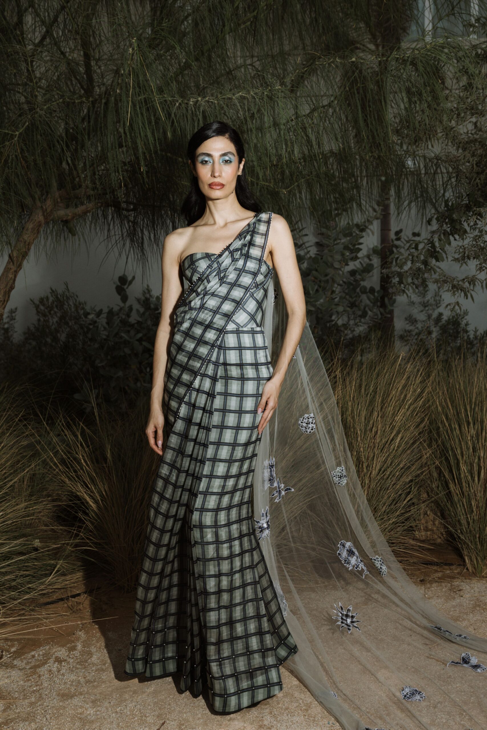 black silk strapless asymmetric fitted pleated embroidered gown