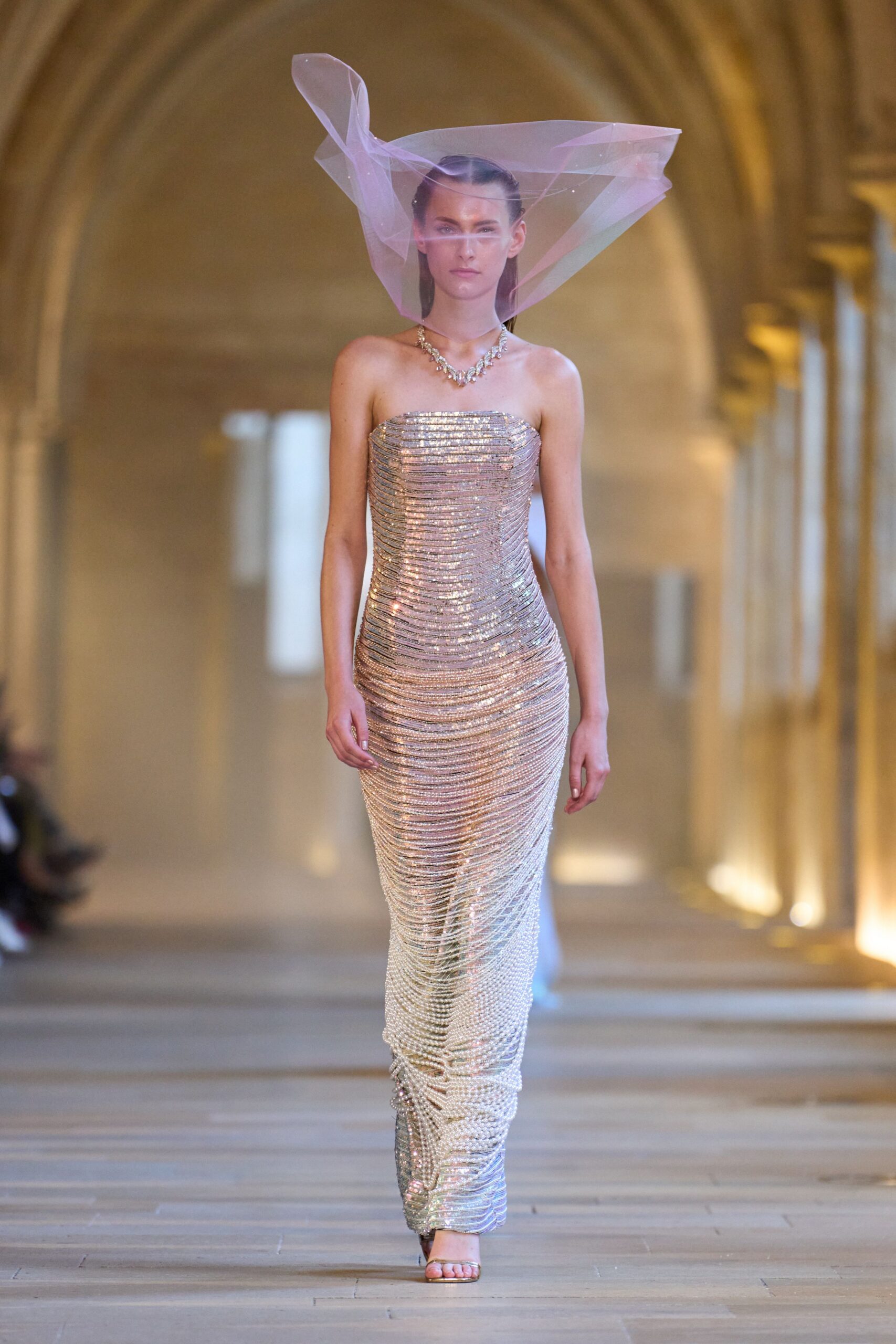silver sequin strapless gown with sheer hat