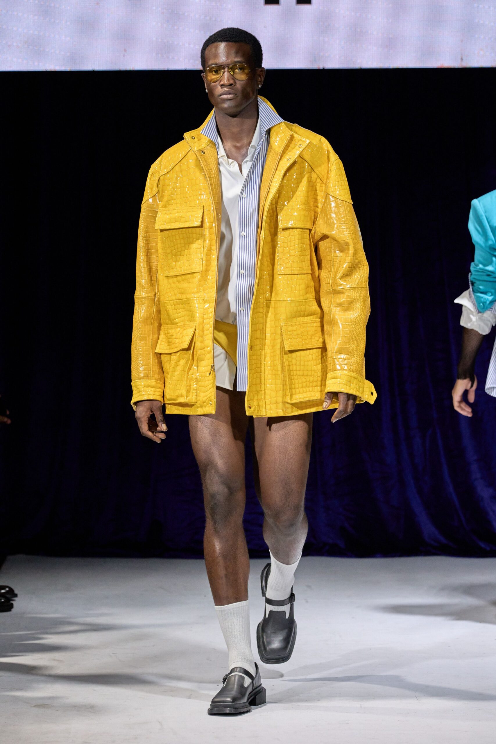 yellow vinyl jacket with shorts