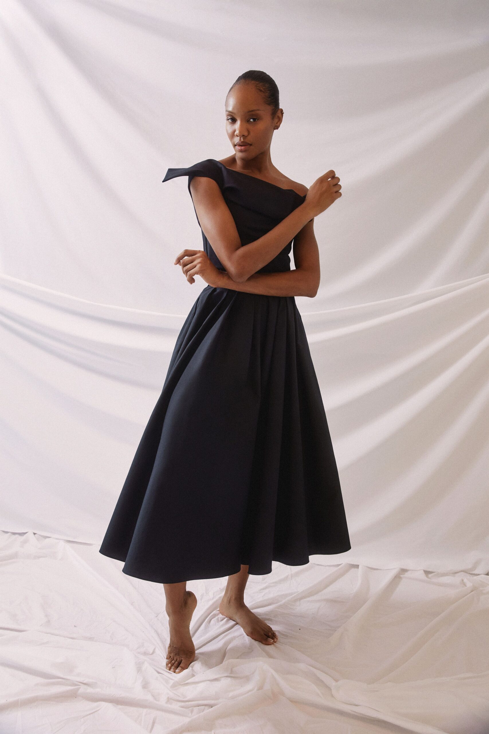 black cotton off-shoulder dress