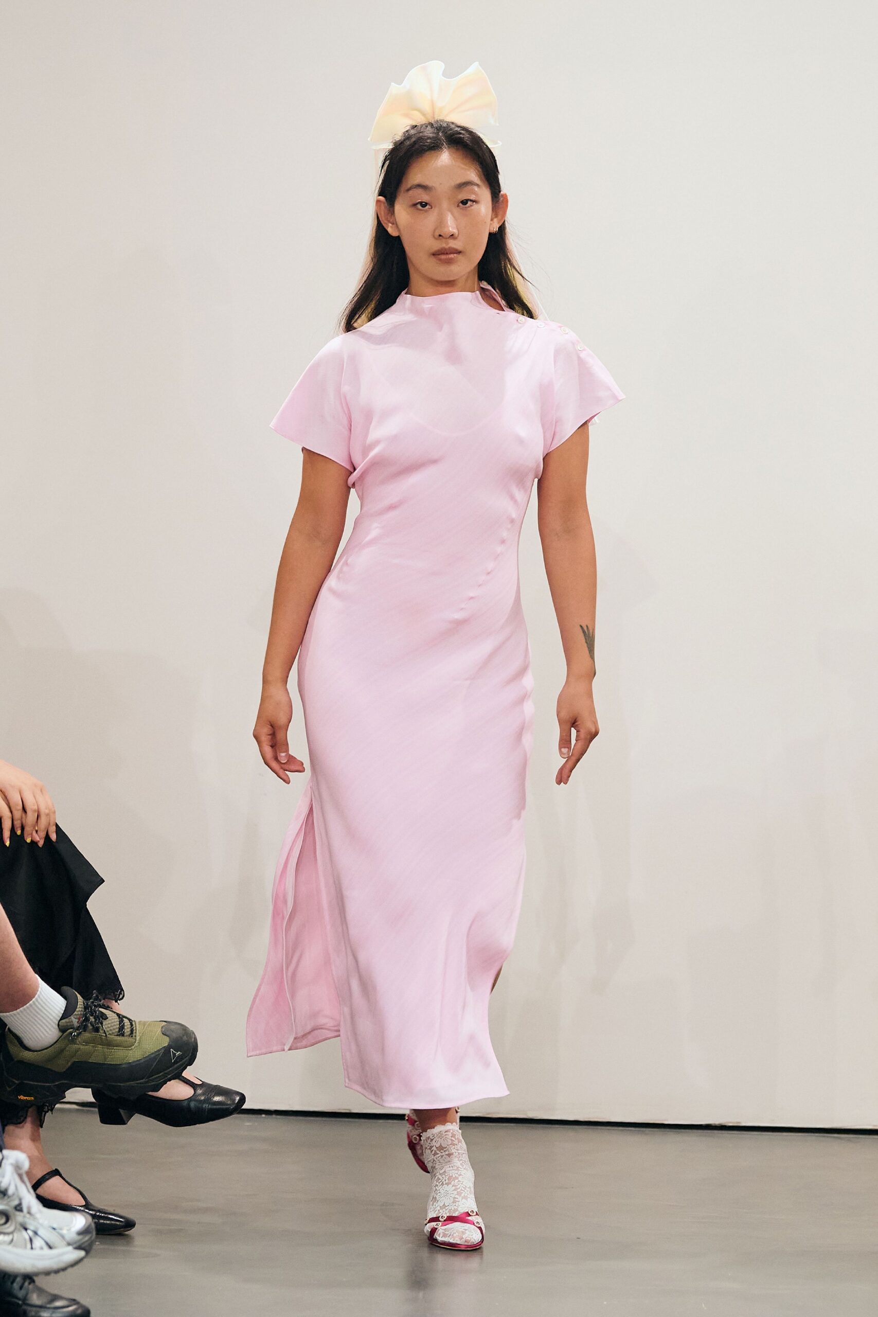 pink silk short-sleeve high-neck fitted pleated flowing dress