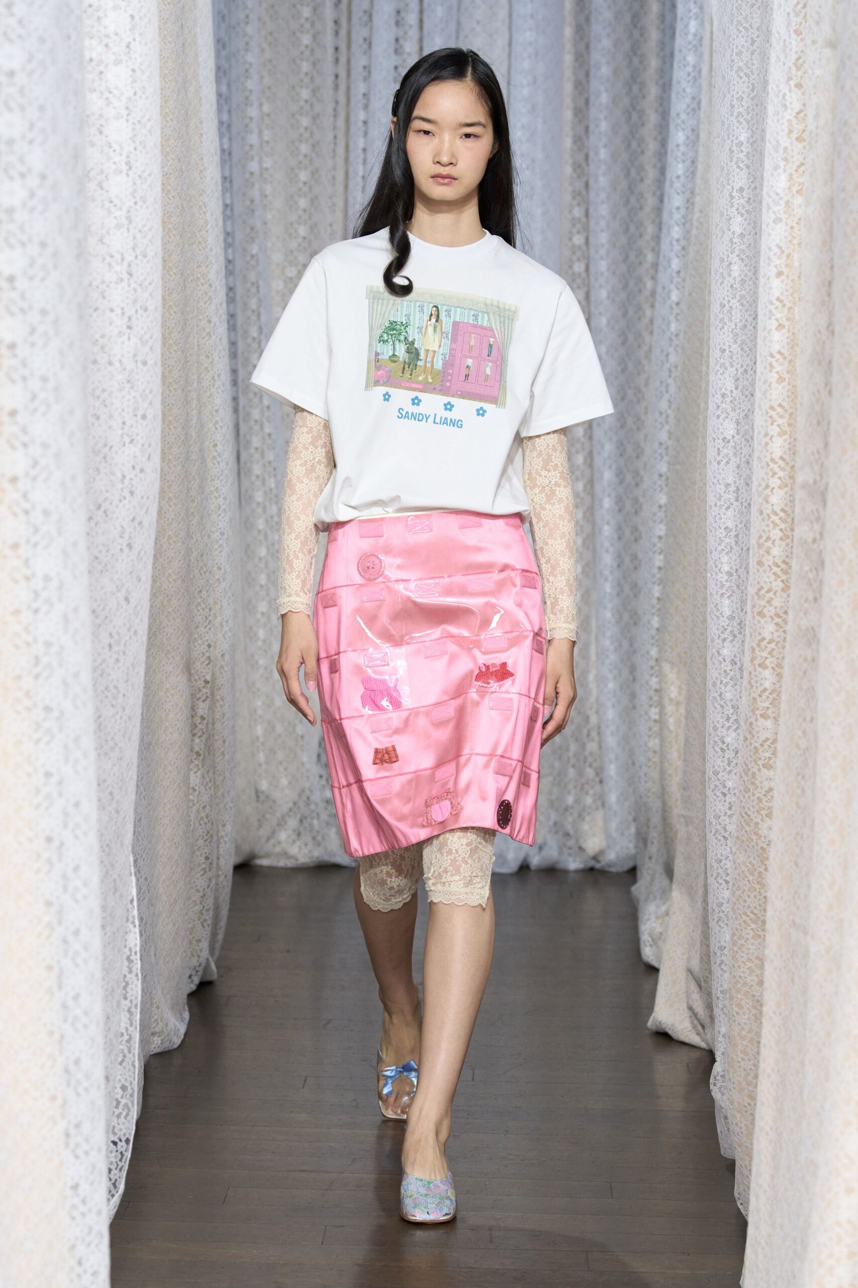 white t-shirt pink skirt