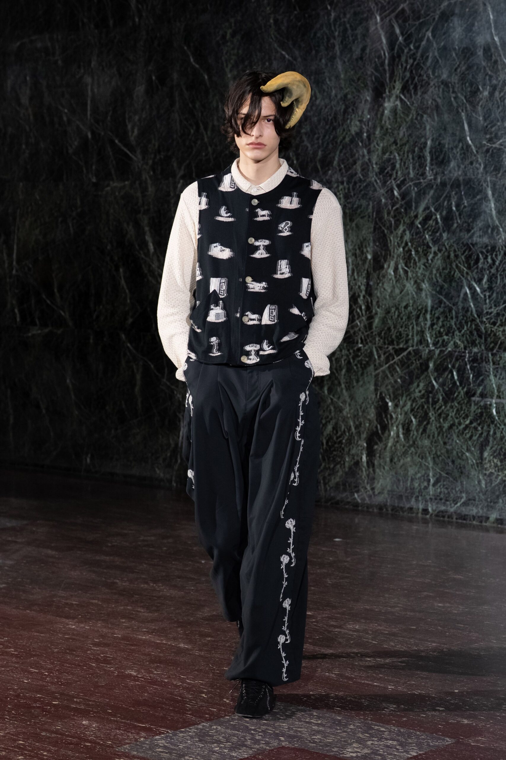 black and white printed vest with relaxed pants