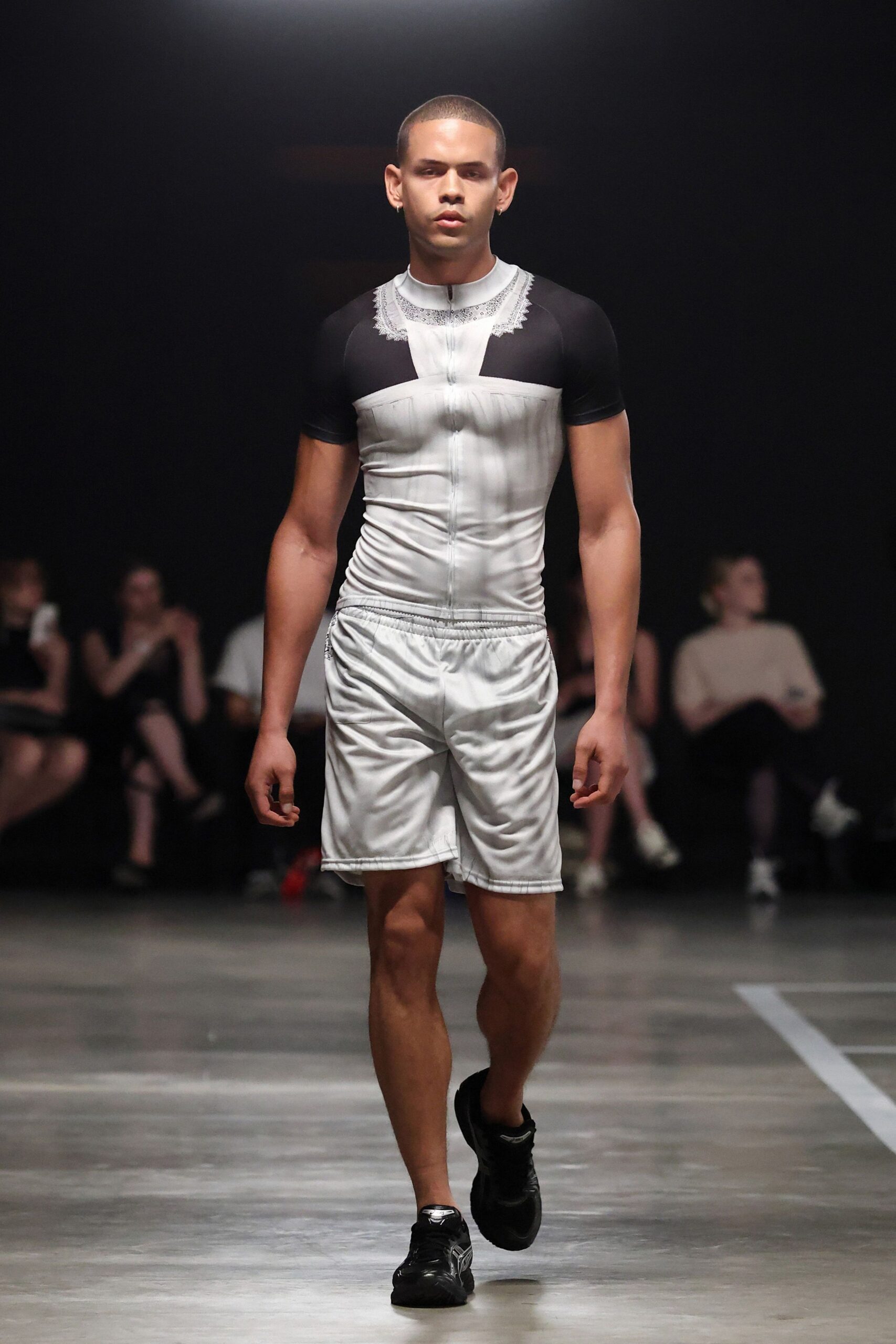 black and white fitted t-shirt with silver shorts