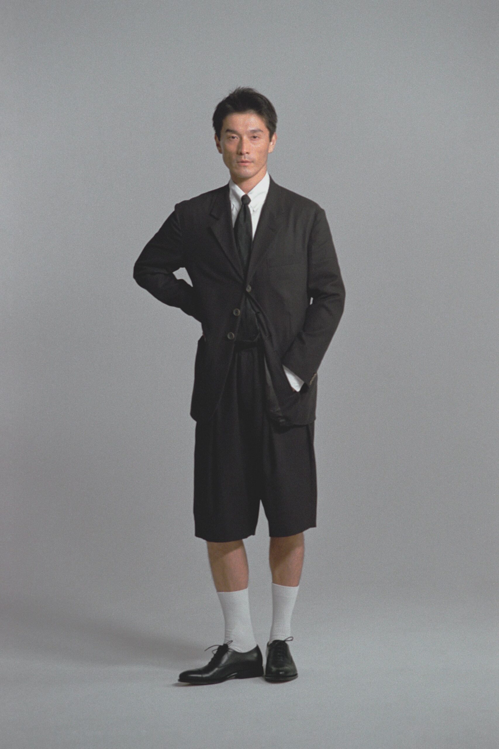 black blazer white shirt shorts