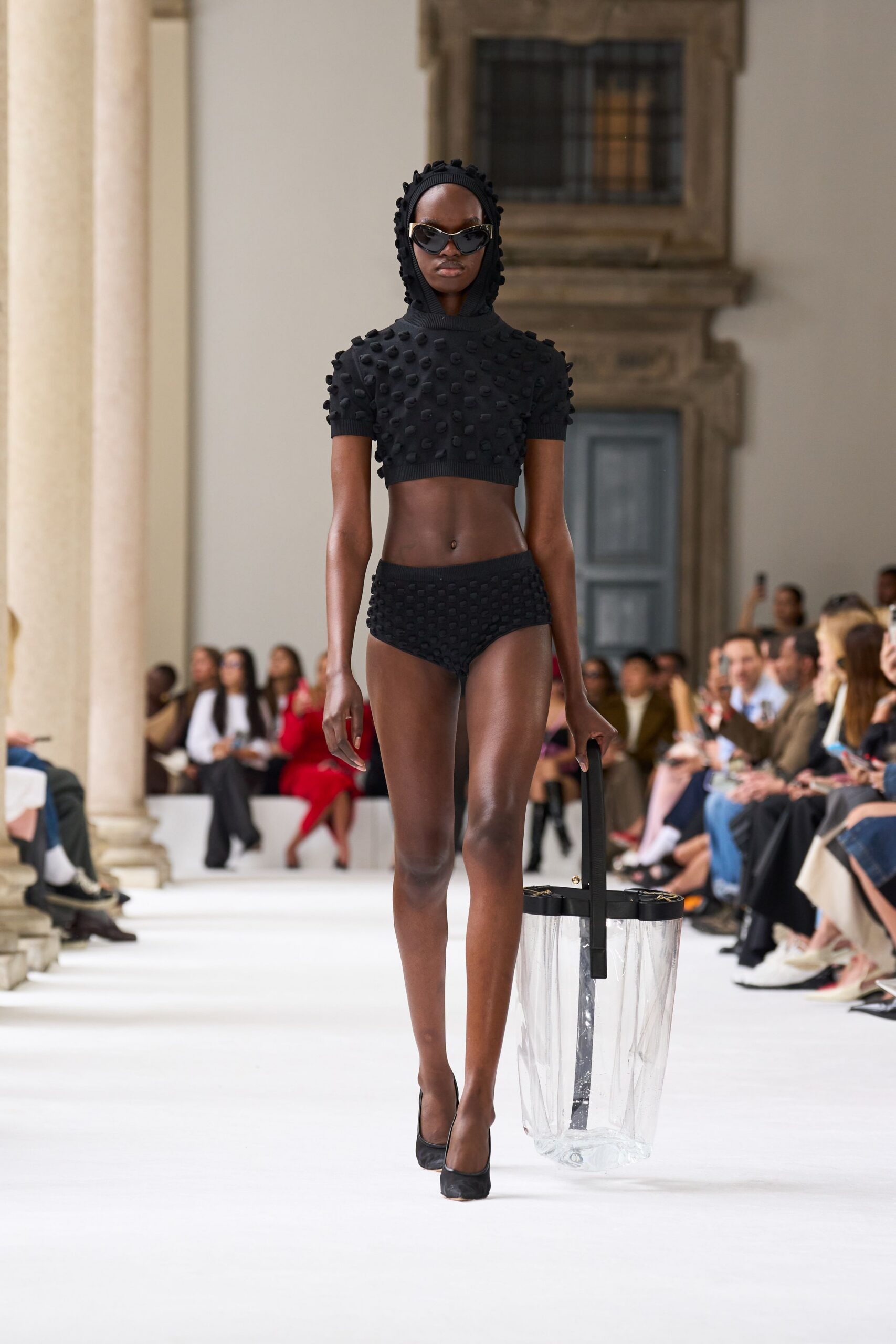 black neoprene crop top and shorts