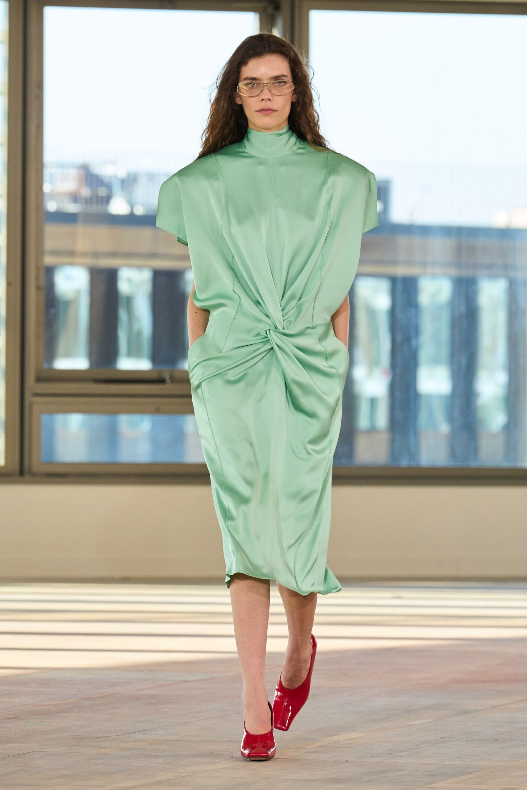 green silk sleeveless high-neck fitted draped flowing dress