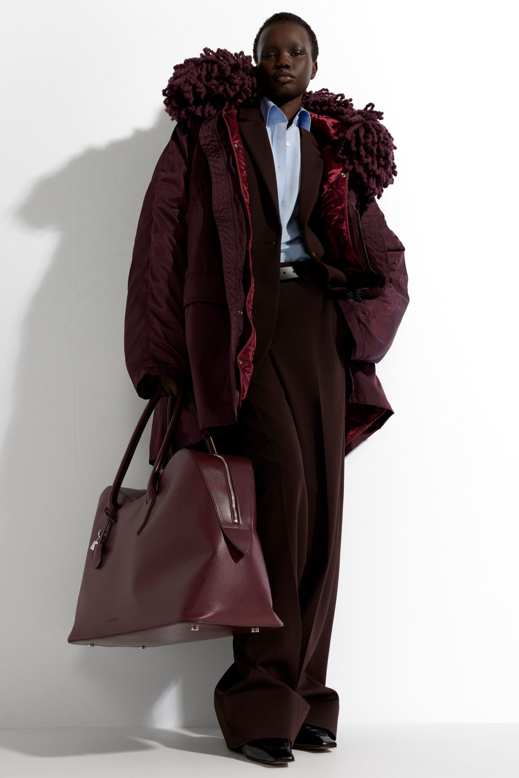 red silk long-sleeve collared oversized ruffled coat