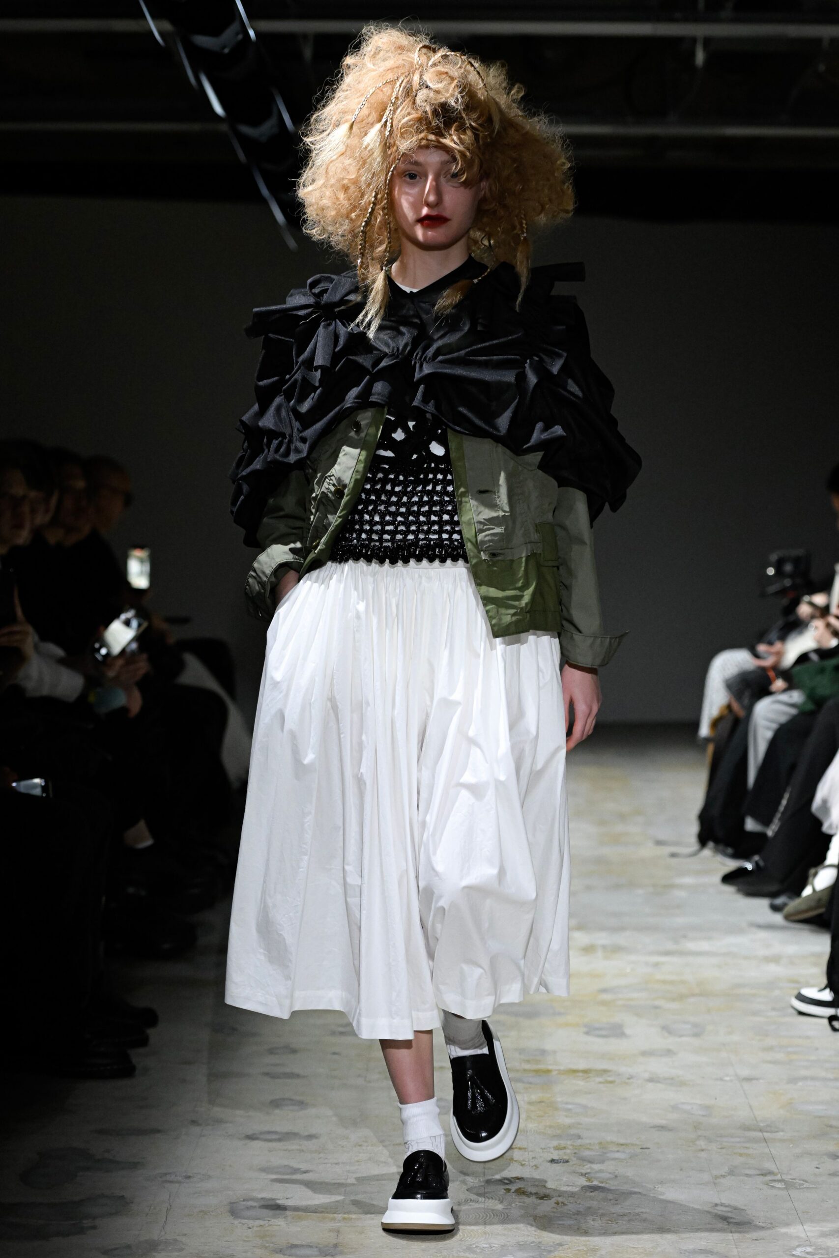green relaxed jacket with black top