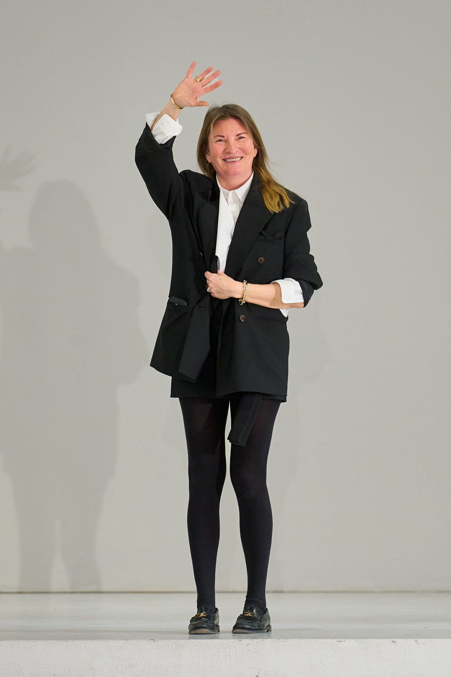 black blazer white shirt black shorts