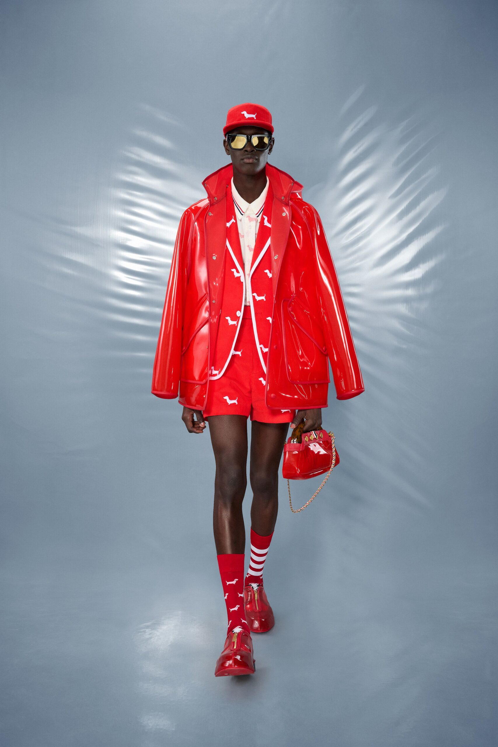 red vinyl long-sleeve collared fitted buttoned shiny blazer