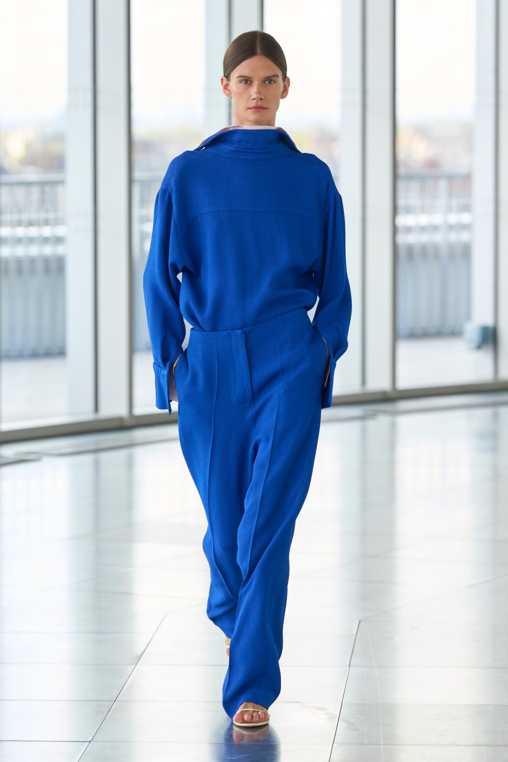 blue cotton long-sleeve collared relaxed zippered jumpsuit