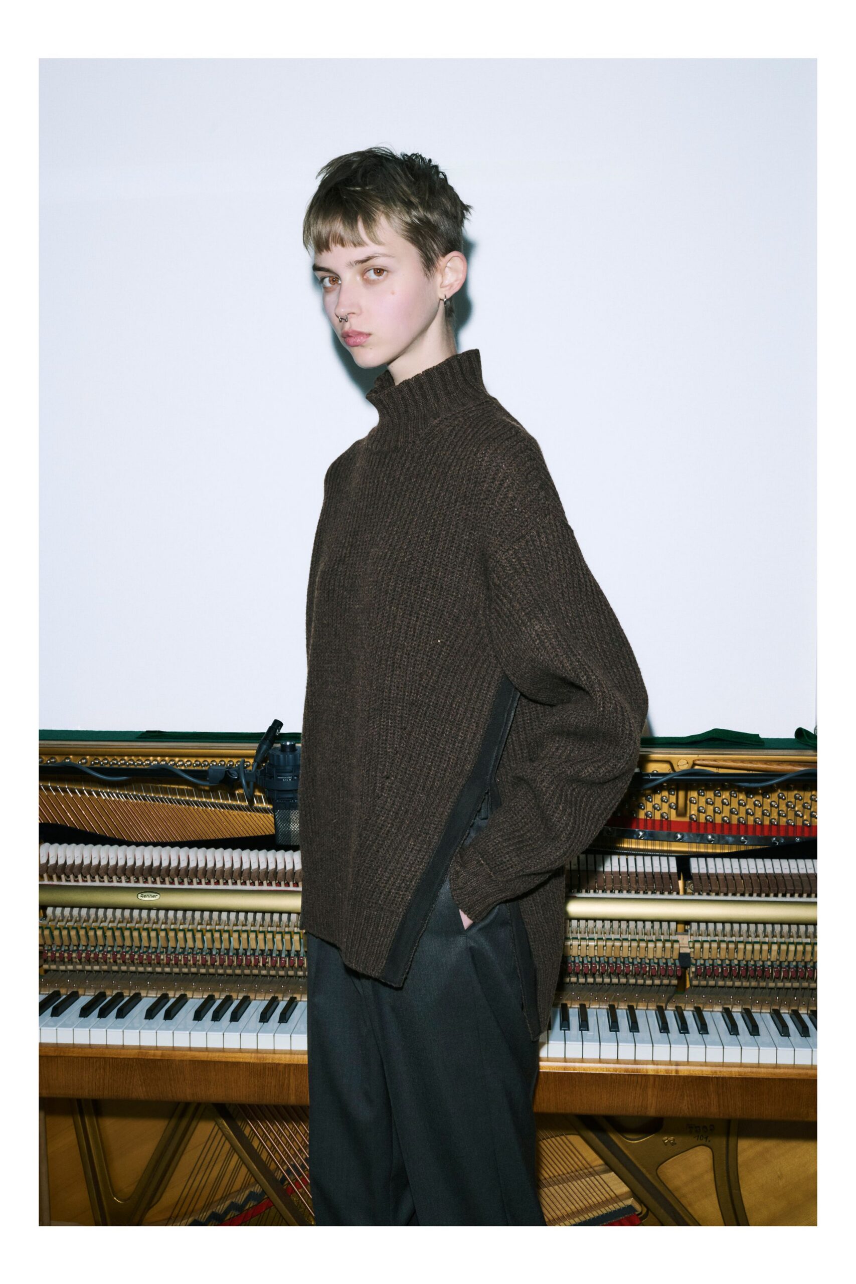 brown wool relaxed sweater and black tailored pants