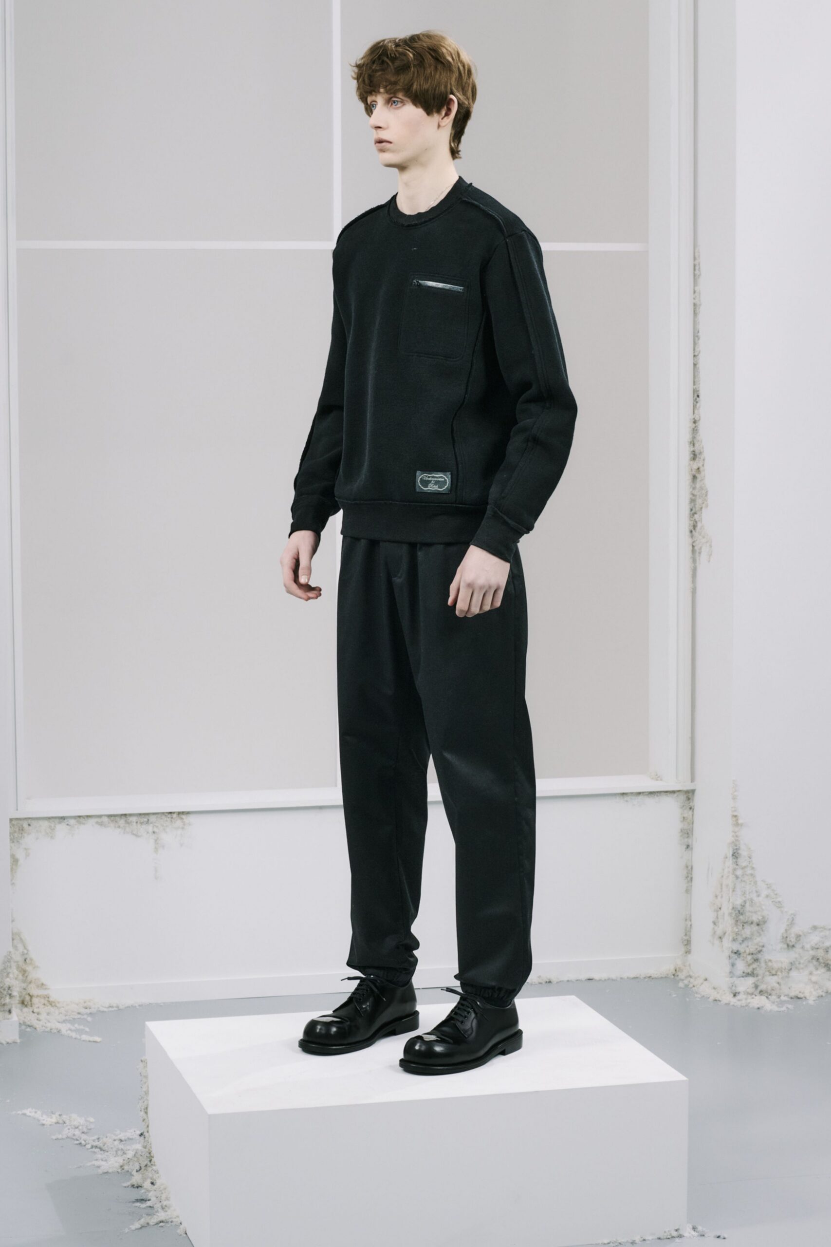 black relaxed sweater and pants