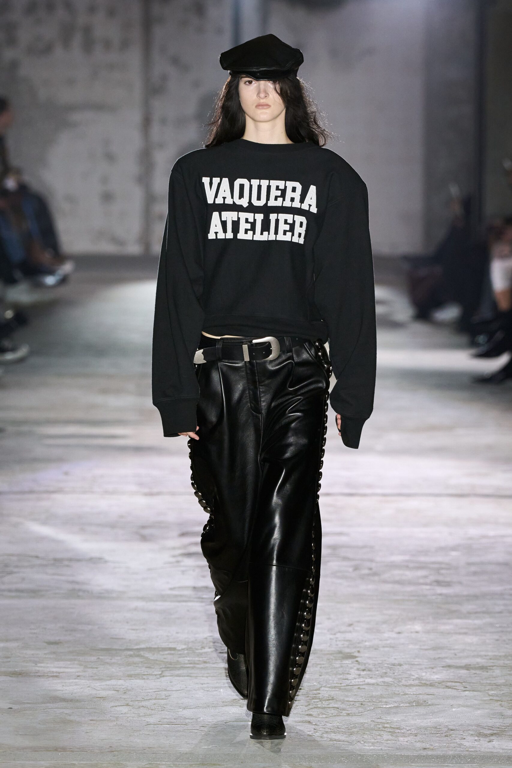 black oversized sweater with leather pants