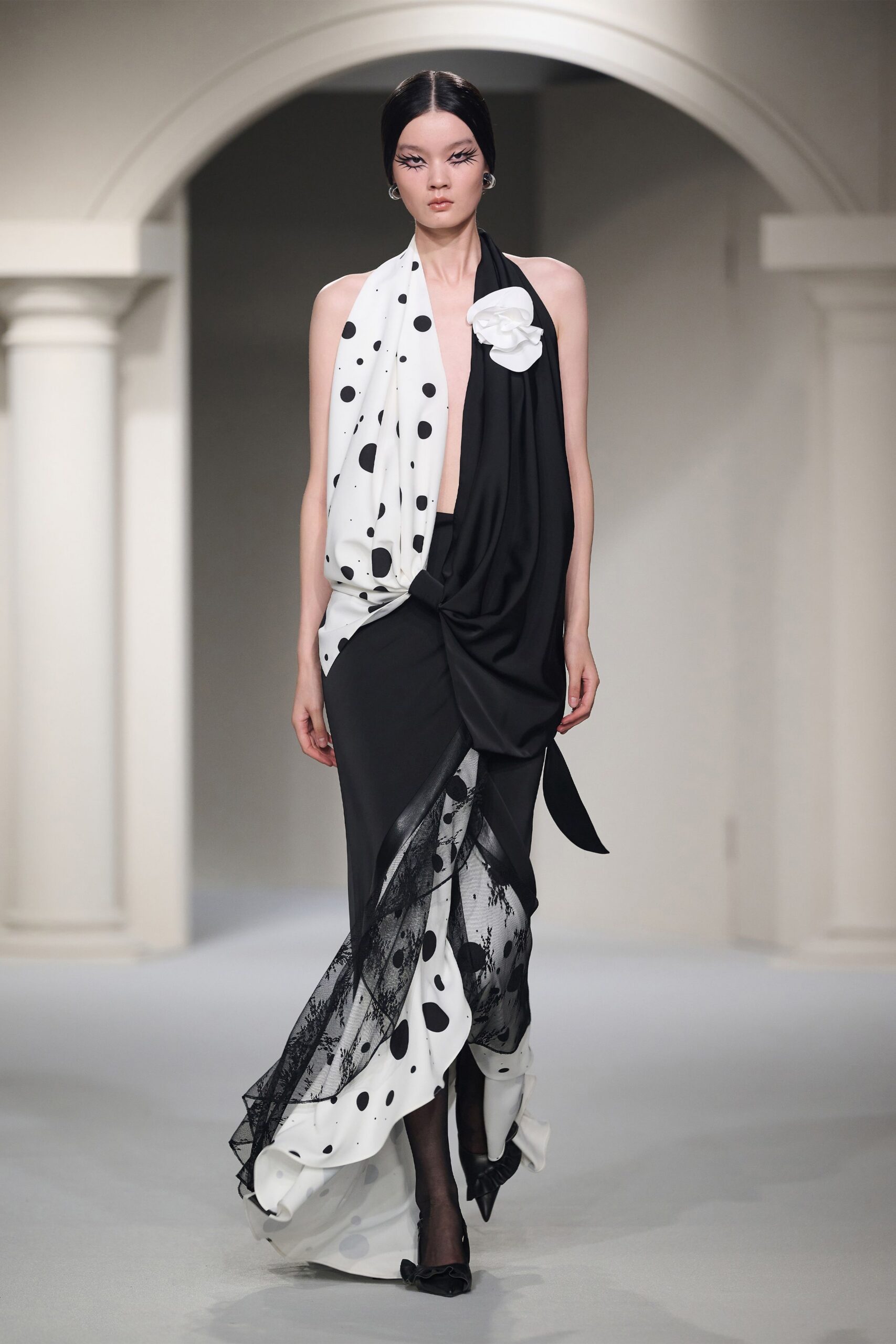 black silk sleeveless v-neck fitted draped polka-dot gown