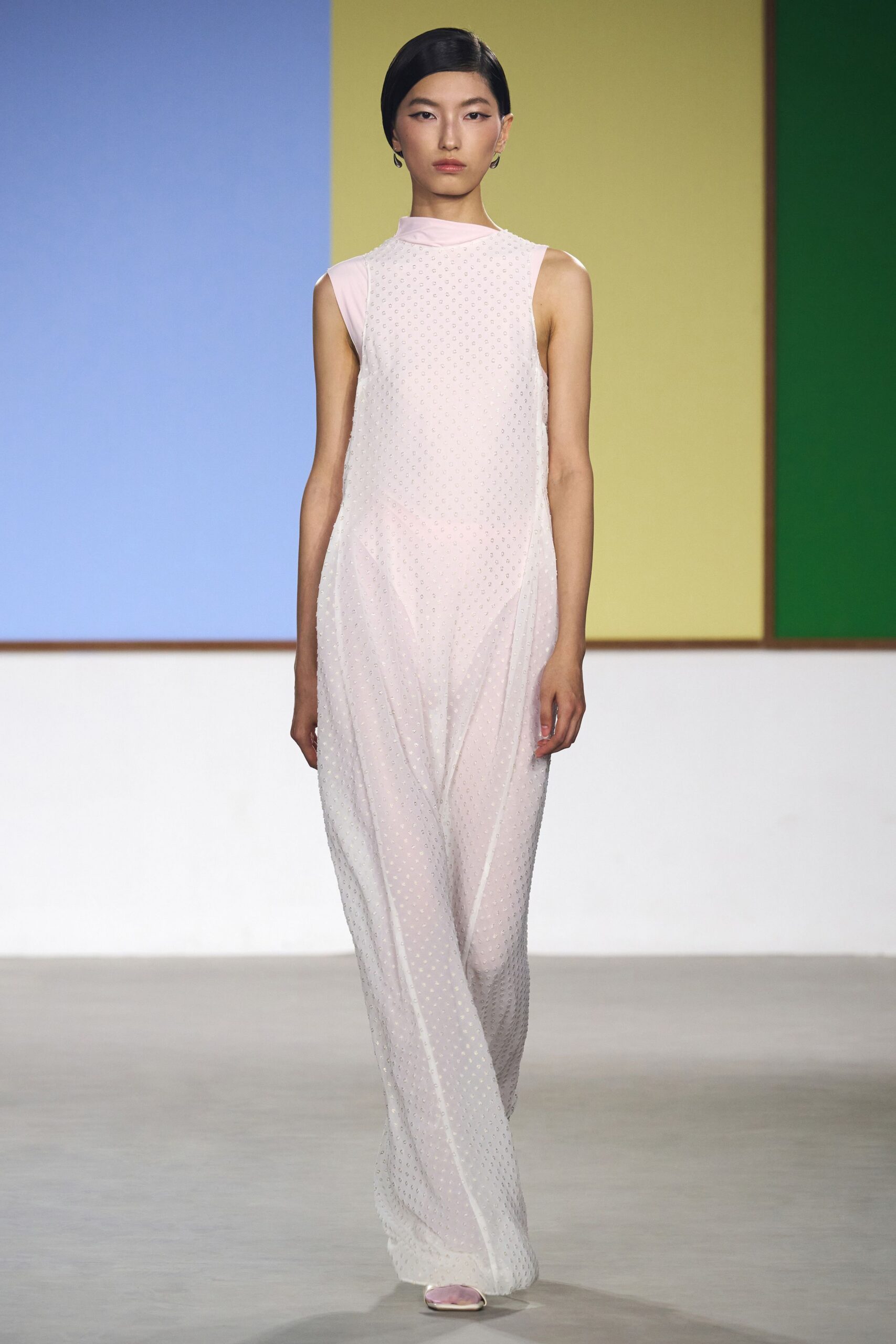 white polka-dot jumpsuit with pink shoes