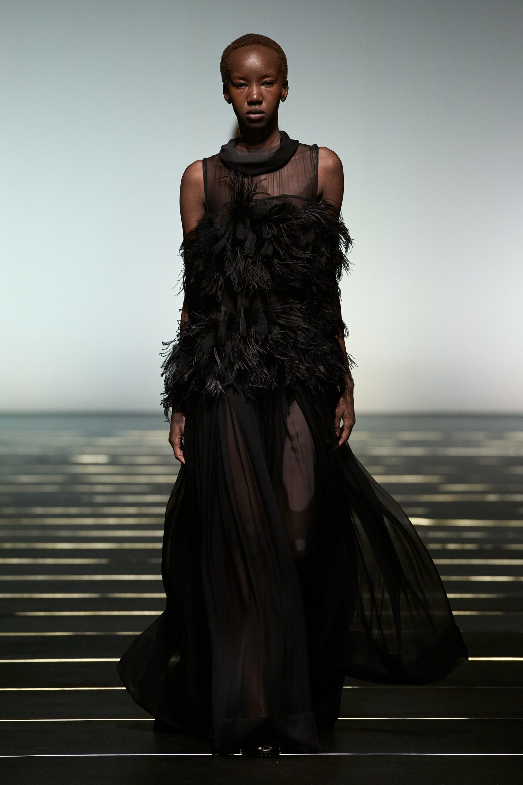 black feathered sleeveless dress