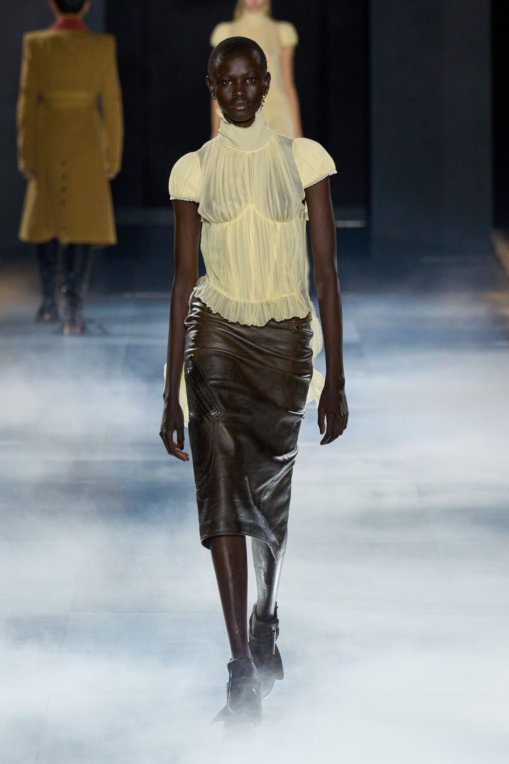 yellow silk short-sleeve high-neck fitted pleated sheer top