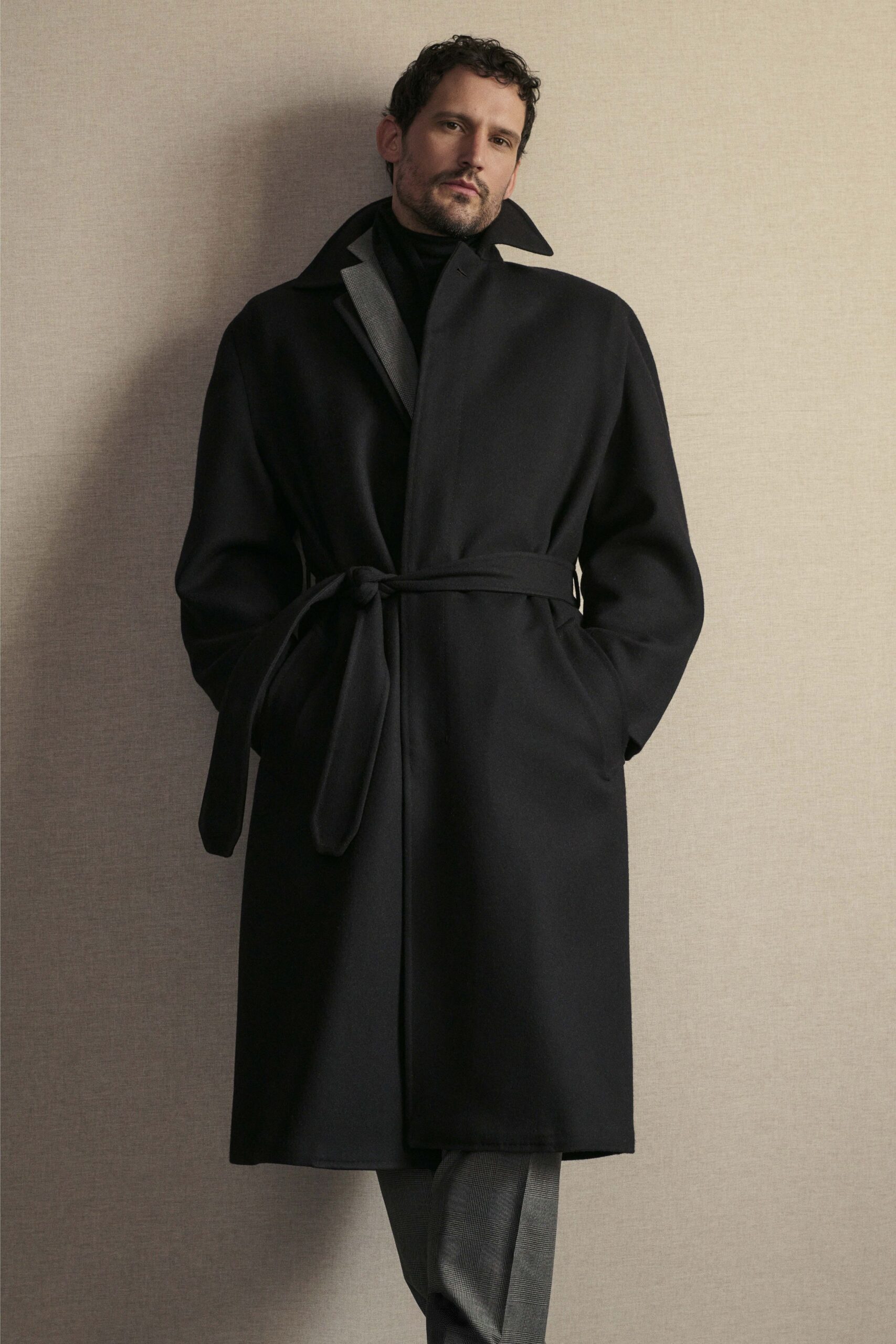 black wool coat with gray pants